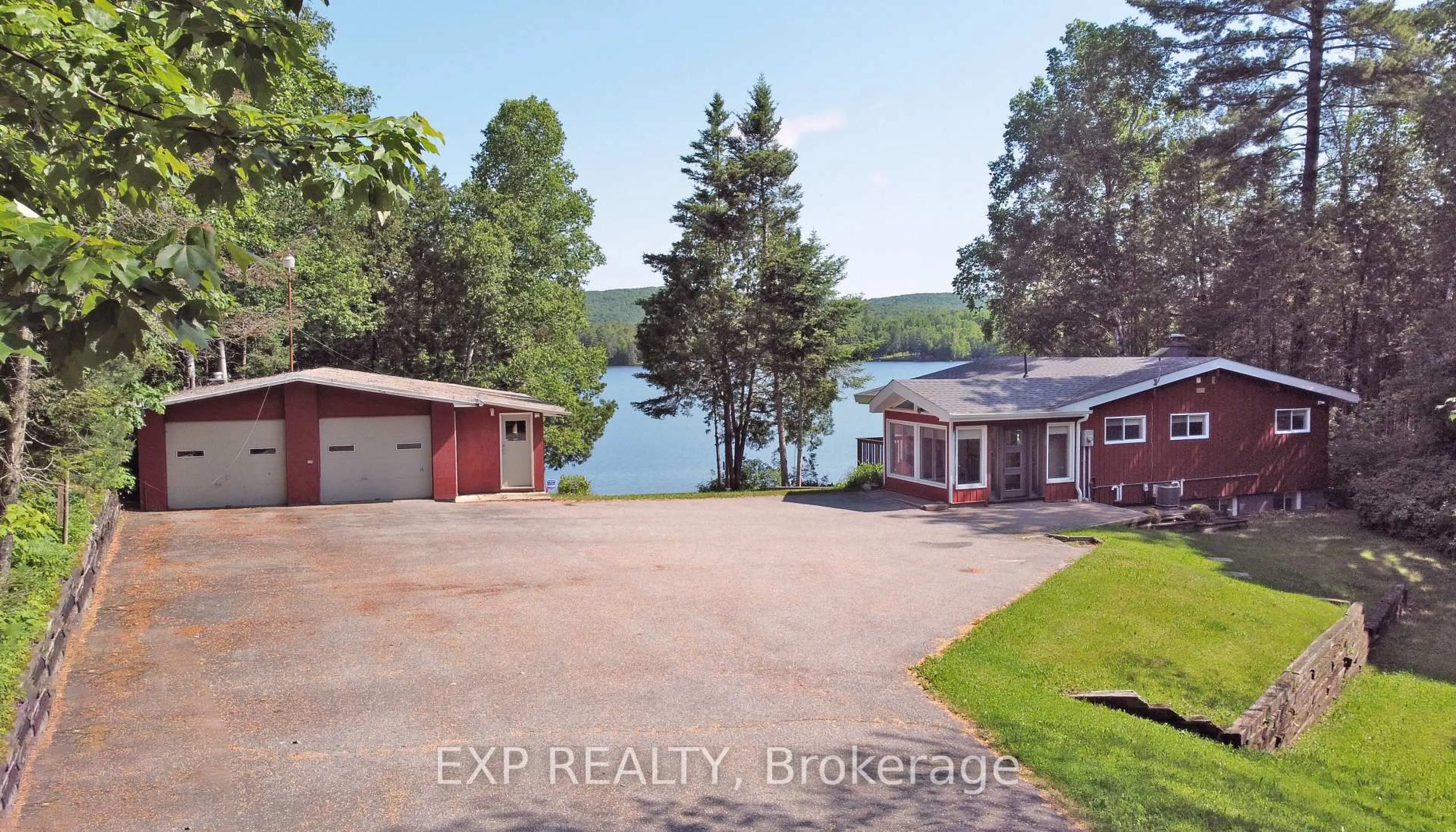 A pic from outside/outdoor area/front of a property/back of a property/a pic from drone, water/lake/river/ocean view for 741 Macpherson Dr, East Ferris Ontario P0H 1K0