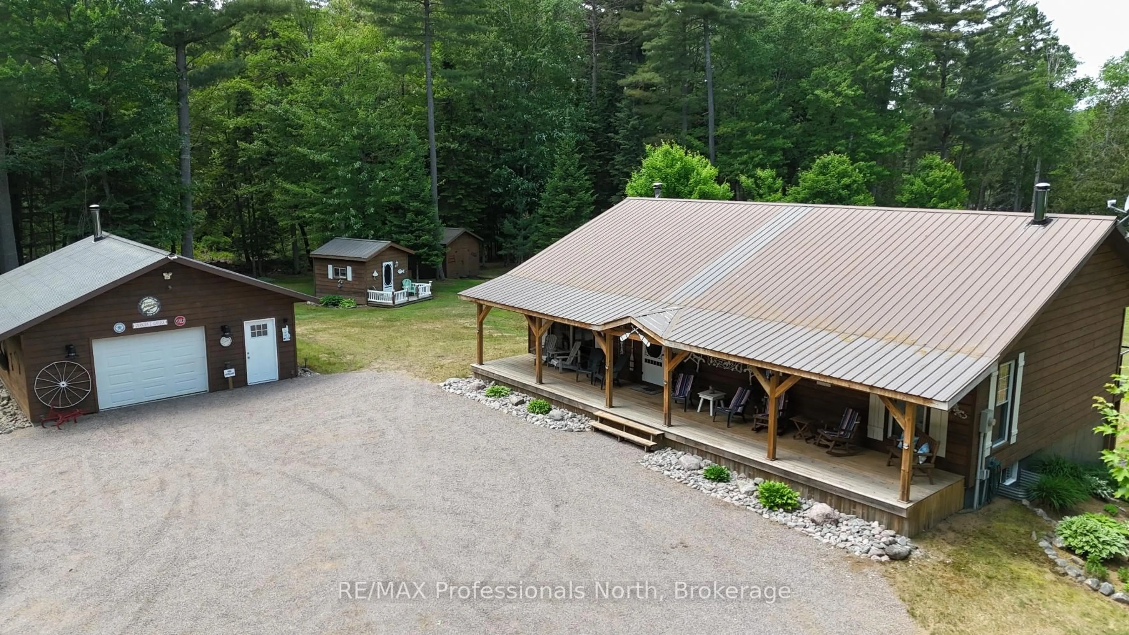A pic from outside/outdoor area/front of a property/back of a property/a pic from drone, mountain view for 3951 Elephant Lake Rd, Dysart et al Ontario K0L 1X0