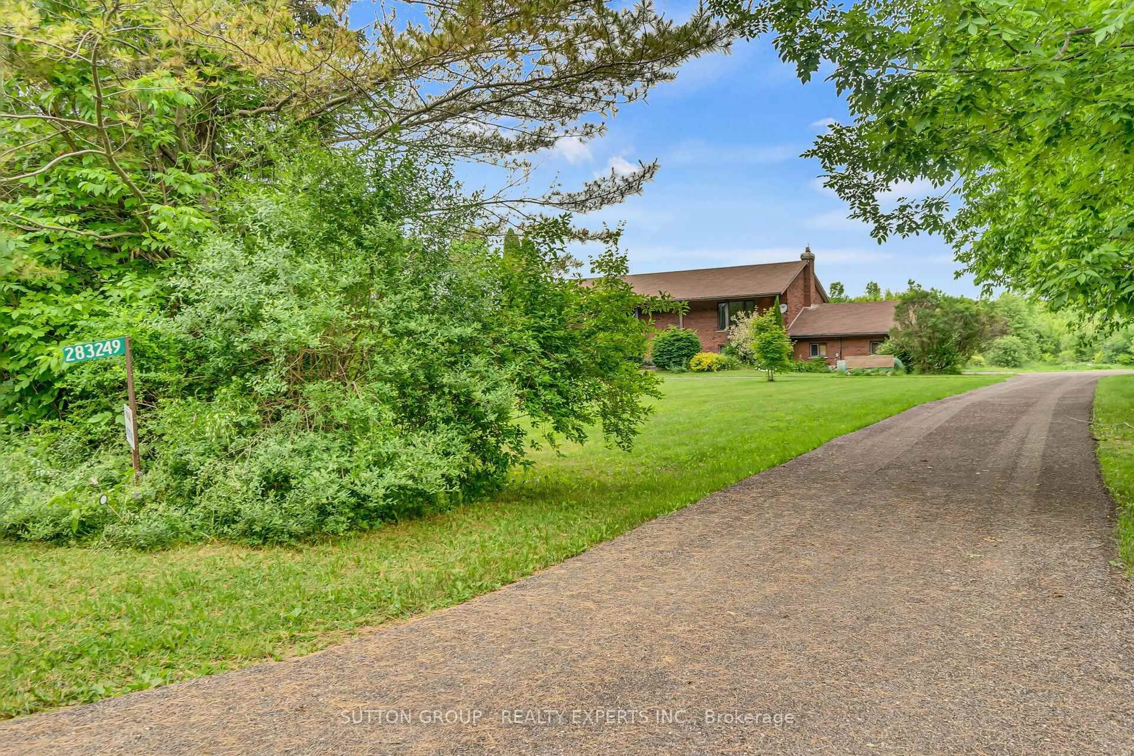 A pic from outside/outdoor area/front of a property/back of a property/a pic from drone, street for 283249 Concession 10 Rd, Georgian Bluffs Ontario N4K 5N4