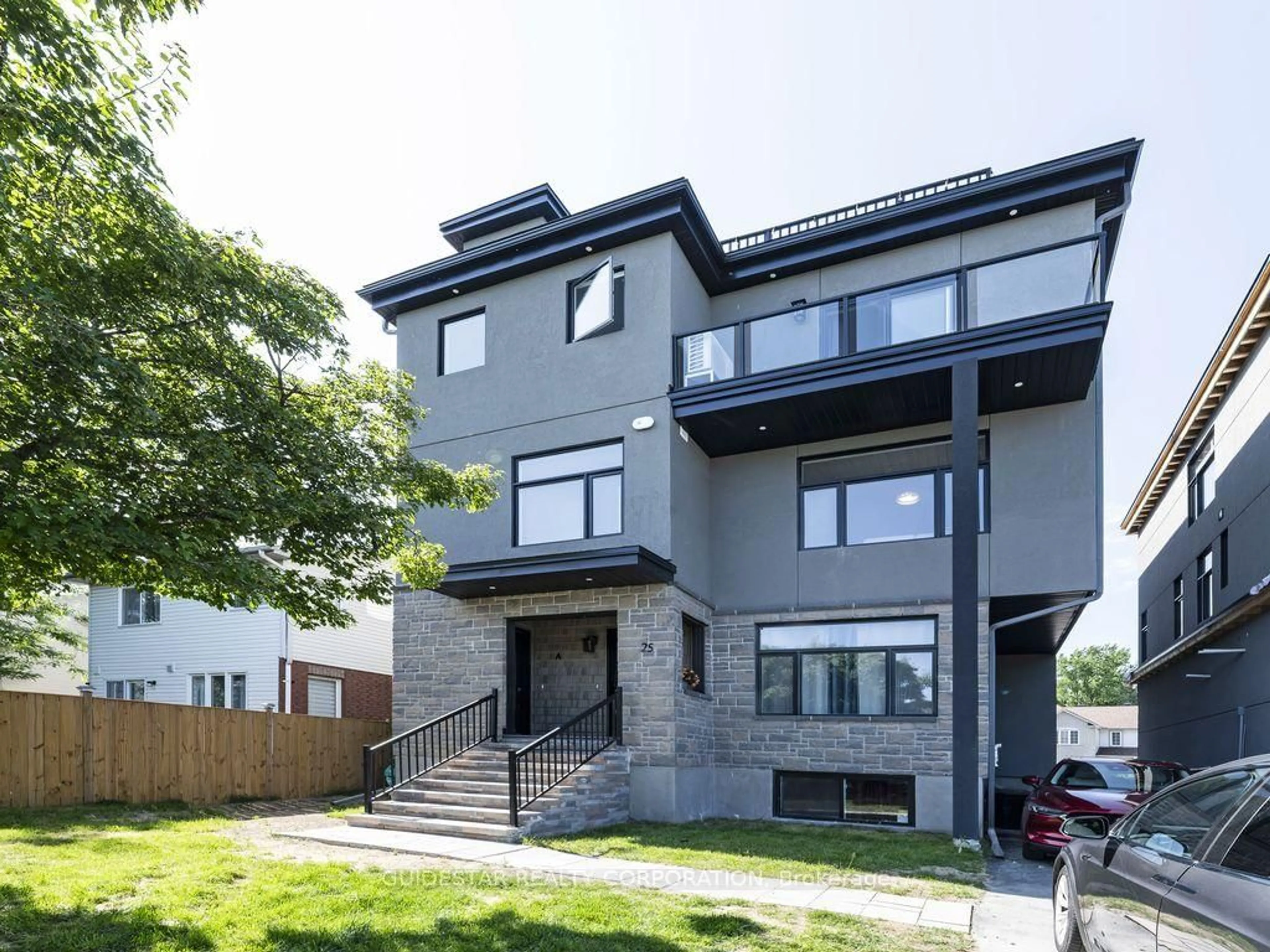 Home with brick exterior material, street for 25 Pennard Way #A & B, Ottawa Ontario K1T 4C1