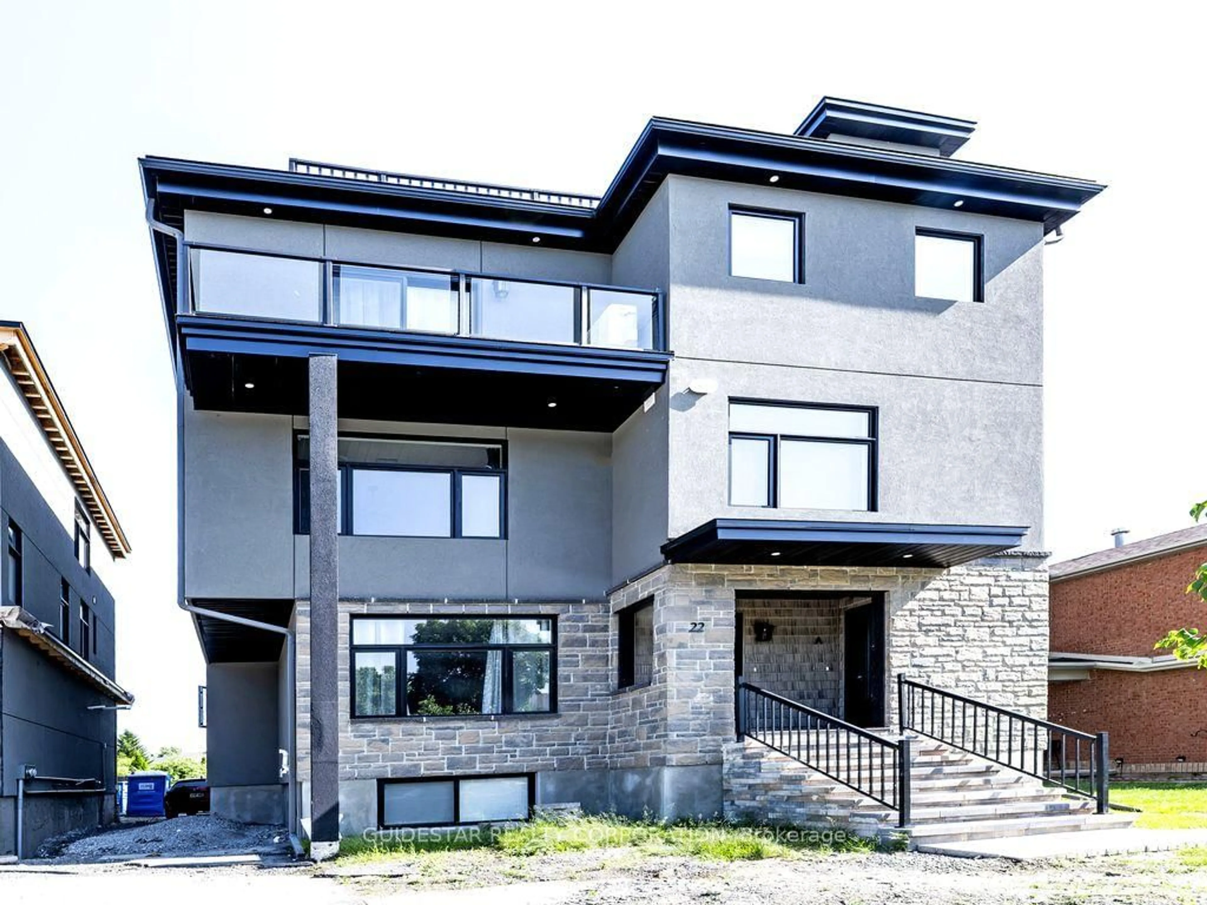 Home with brick exterior material, building for 22 Inverkip Ave #A/B, Ottawa Ontario K1T 4B7