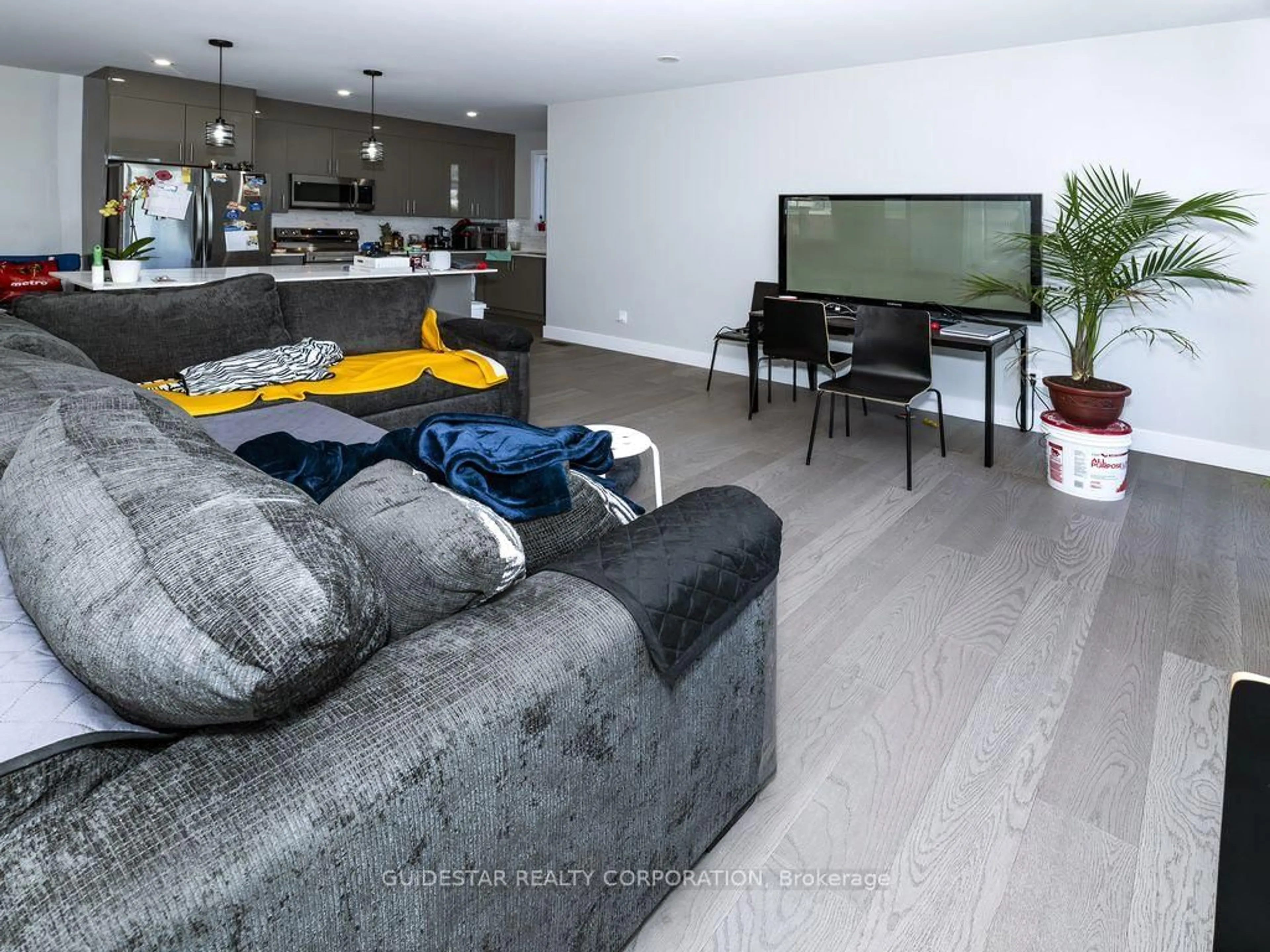 Living room with furniture, unknown for 22 Inverkip Ave #A/B, Ottawa Ontario K1T 4B7