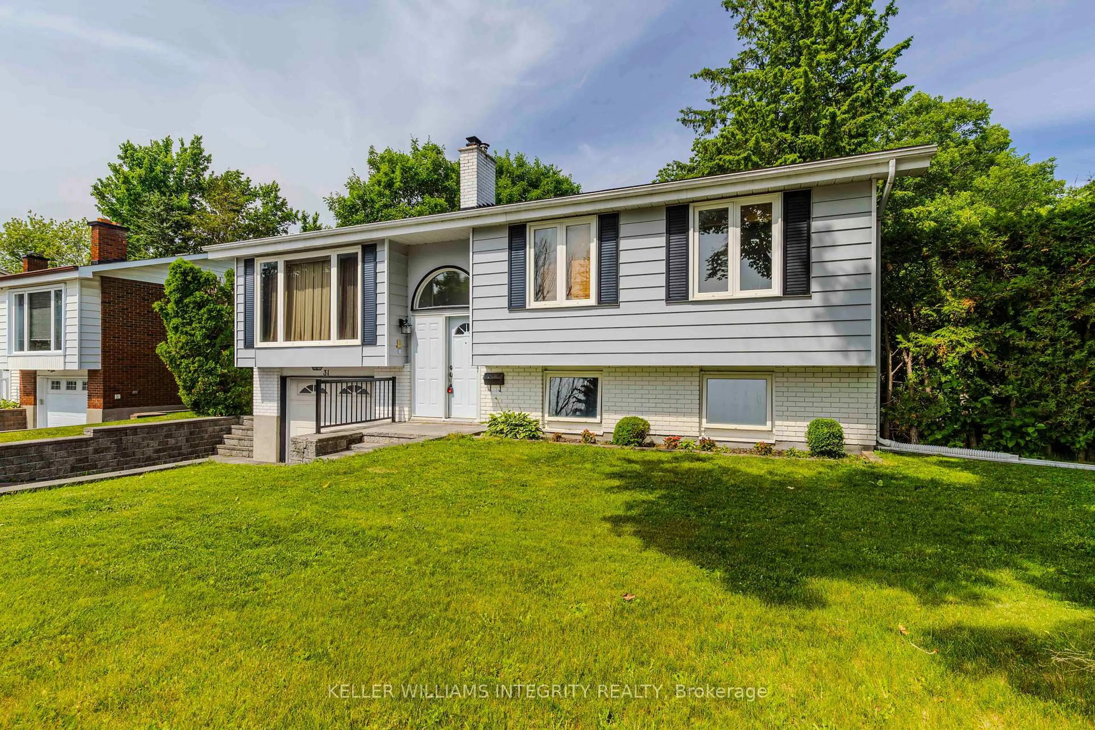 Home with vinyl exterior material, street for 31 Ashgrove Cres, Ottawa Ontario K2G 0S1