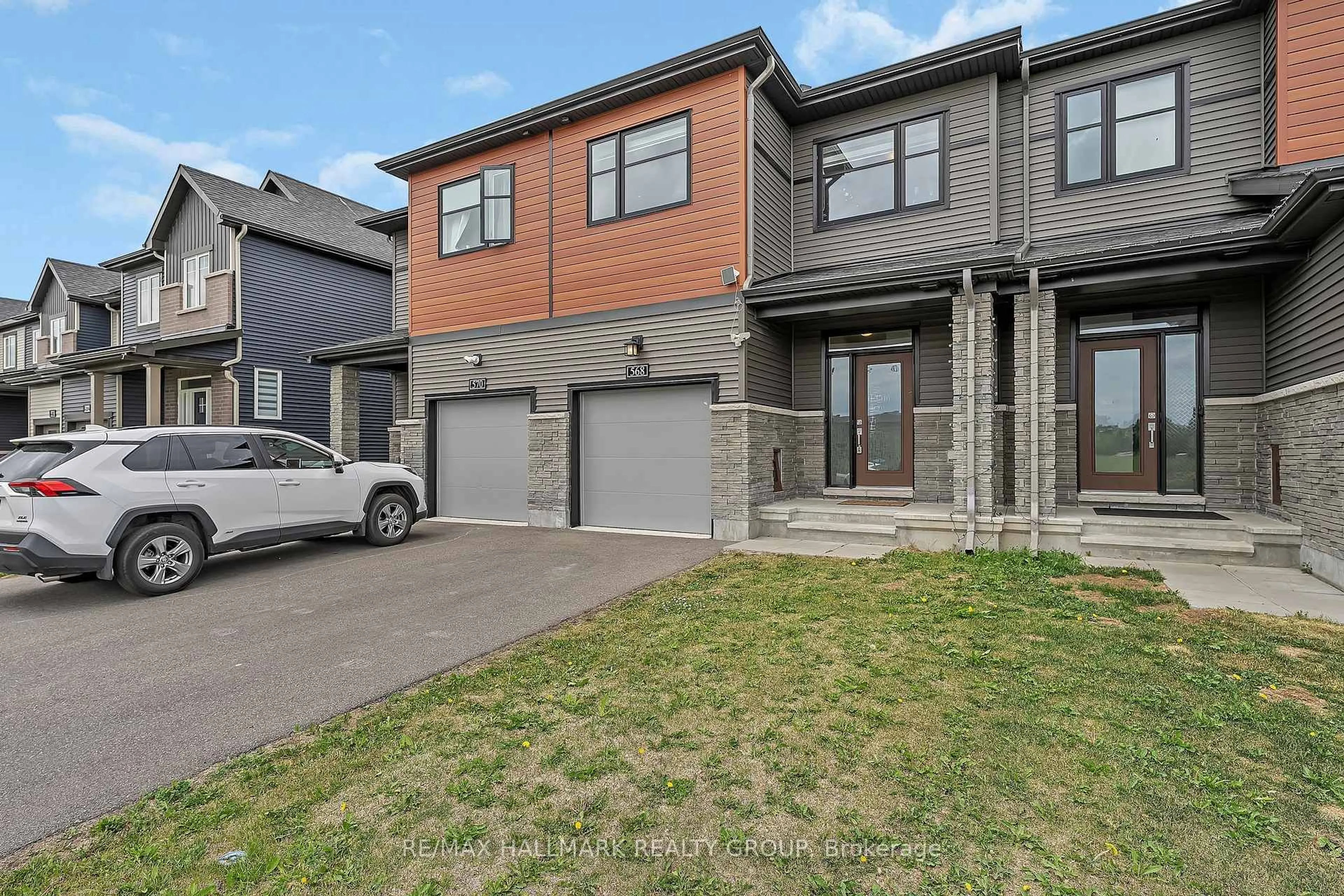 Home with brick exterior material, street for 568 Prominence Way, Ottawa Ontario K4A 5K9