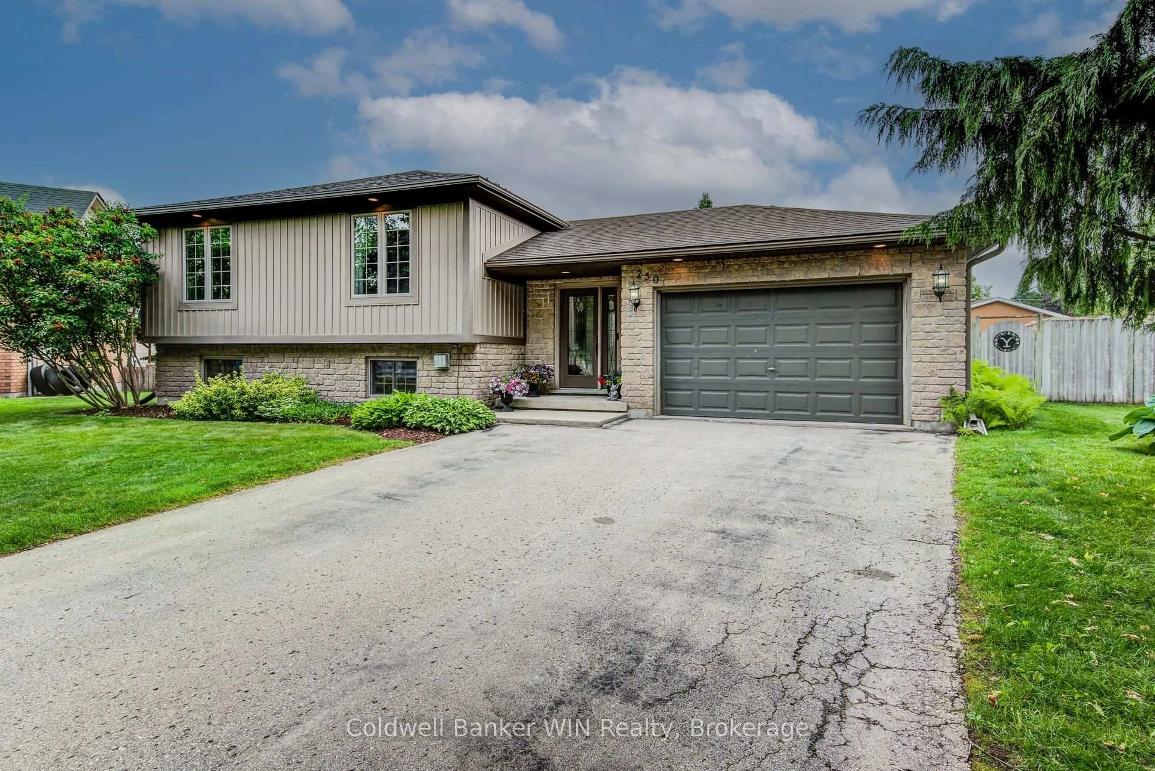 Home with brick exterior material, street for 250 Justin's Pl, Wellington North Ontario N0G 2L3