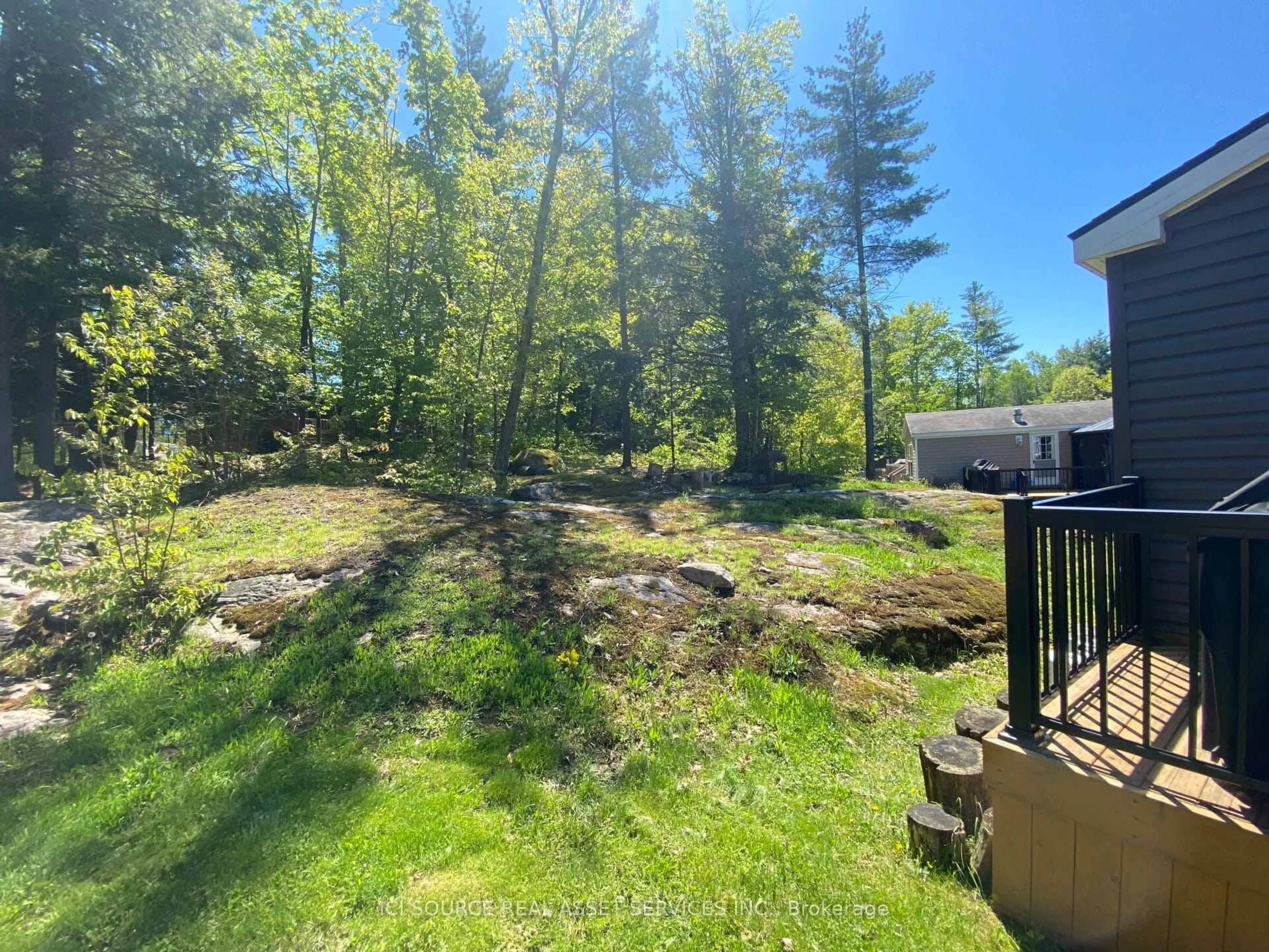 A pic from outside/outdoor area/front of a property/back of a property/a pic from drone, forest/trees view for 1082 Shamrock Marina Rd #SMR251, Gravenhurst Ontario P0E 1N0