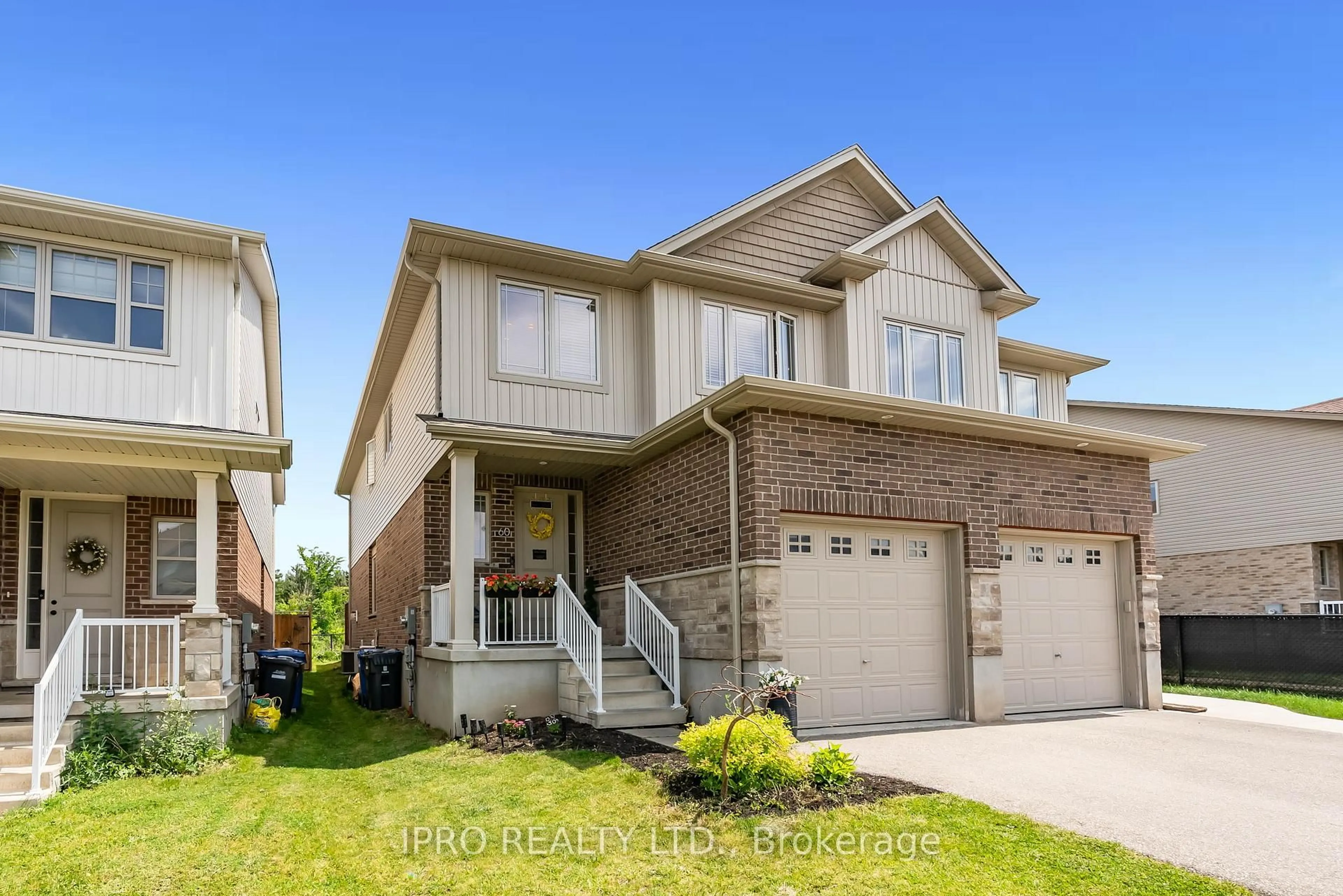 Home with brick exterior material, street for 60 Dallan Dr, Guelph Ontario N1L 0N2
