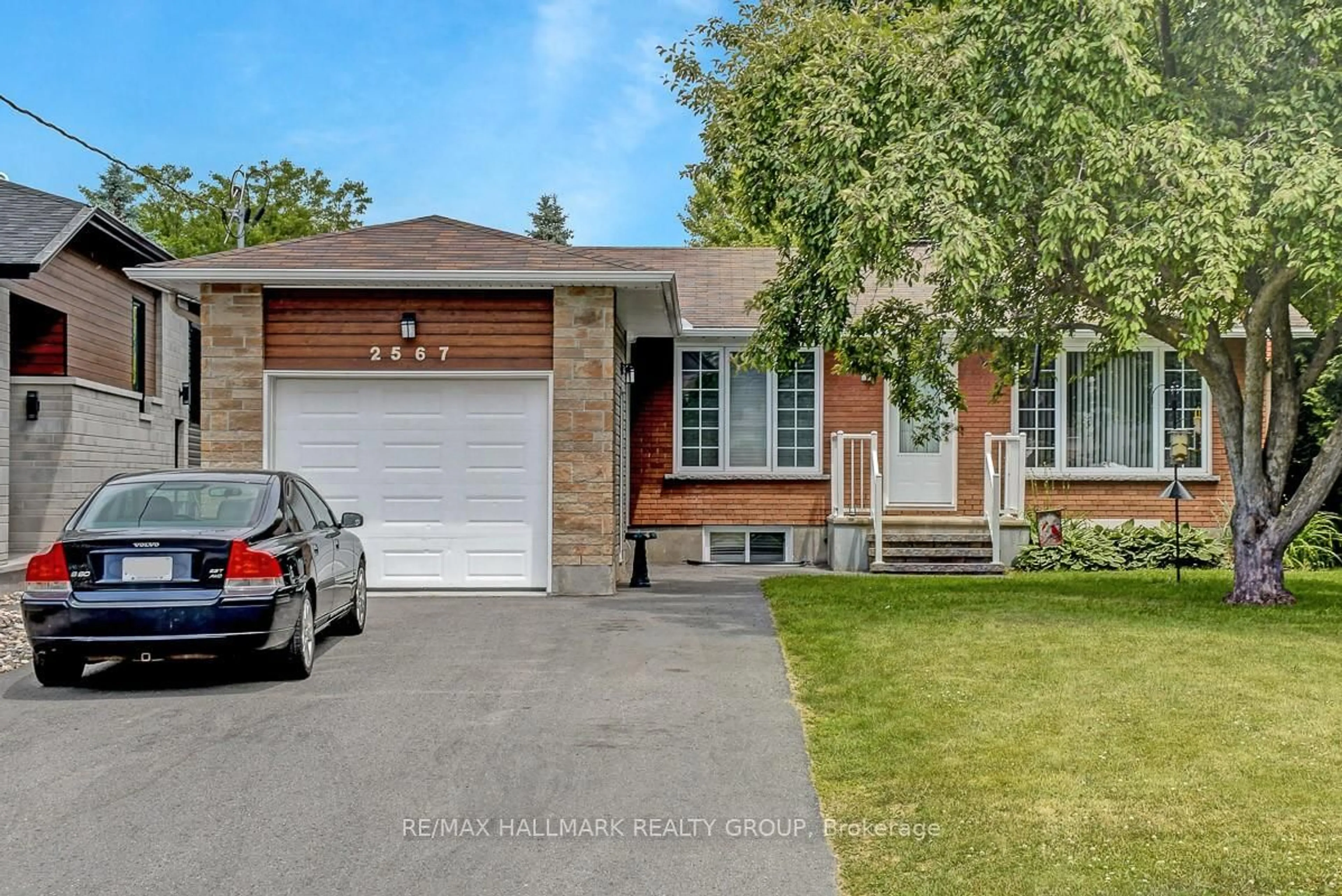 Home with brick exterior material, street for 2565 Page Rd, Ottawa Ontario K1W 1E5