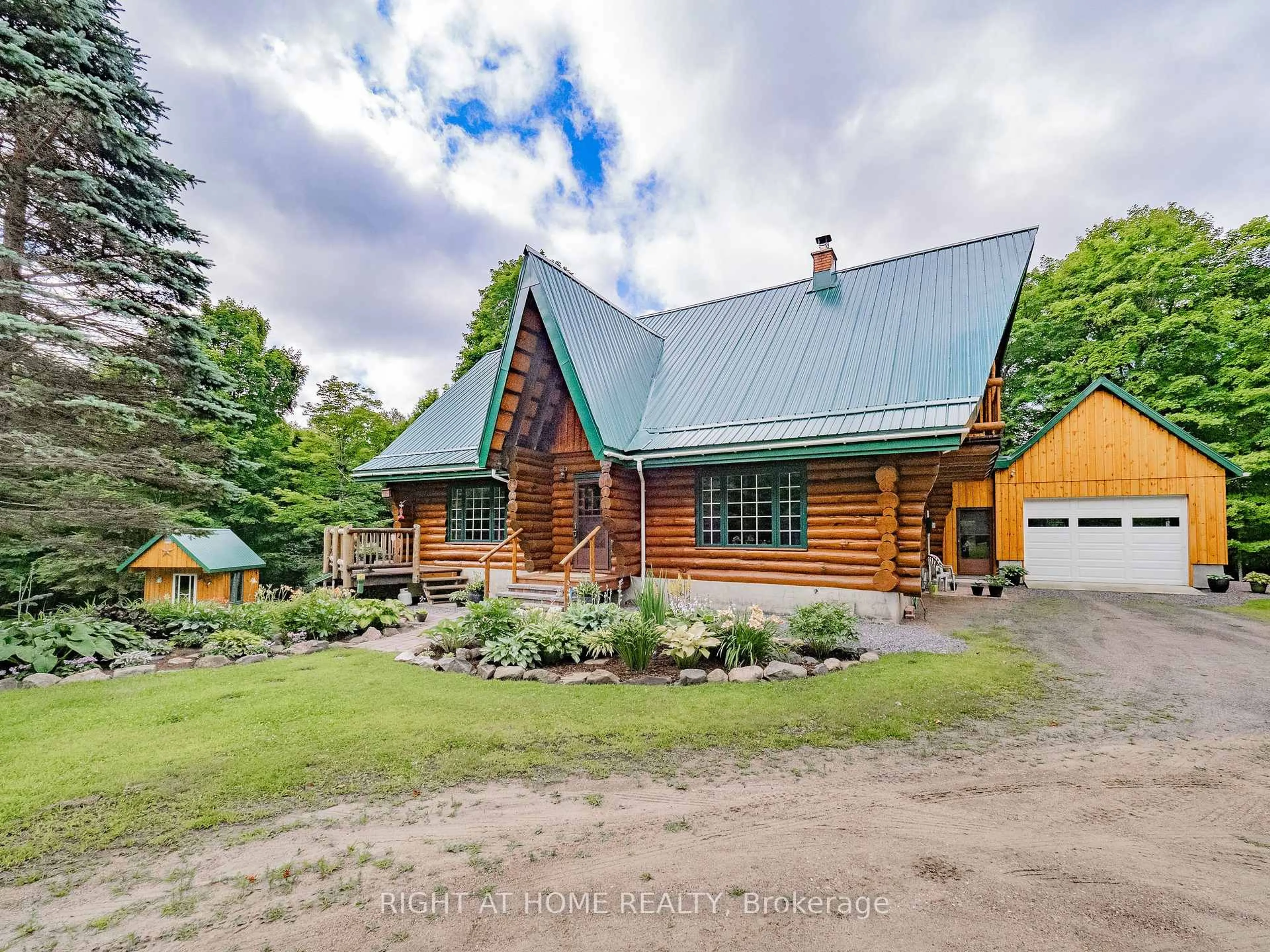 A pic from outside/outdoor area/front of a property/back of a property/a pic from drone, unknown for 1696 Highway 118, Bracebridge Ontario P1L 1X1
