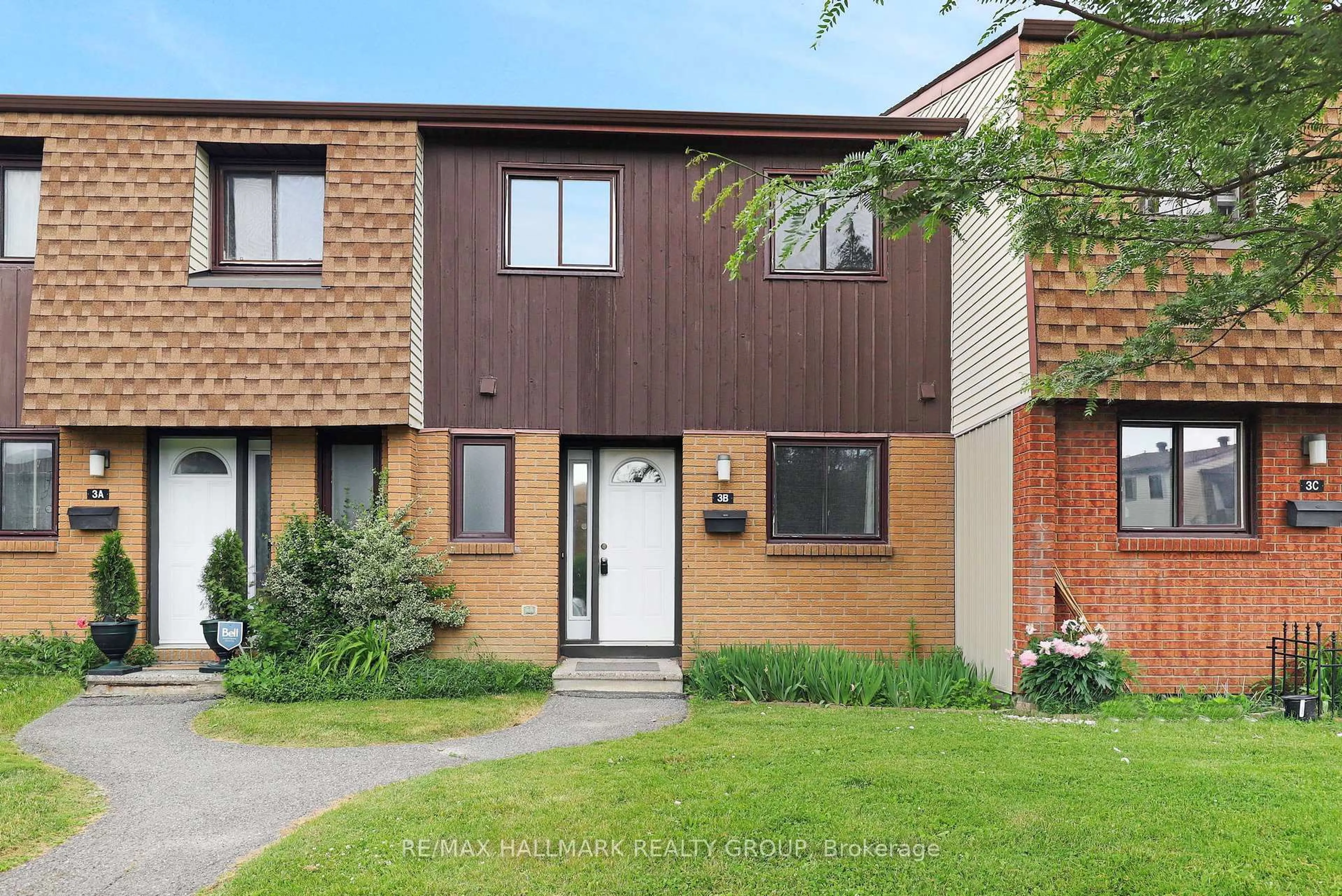 Home with brick exterior material, street for 3B Woodvale Green, Ottawa Ontario K2G 4G9