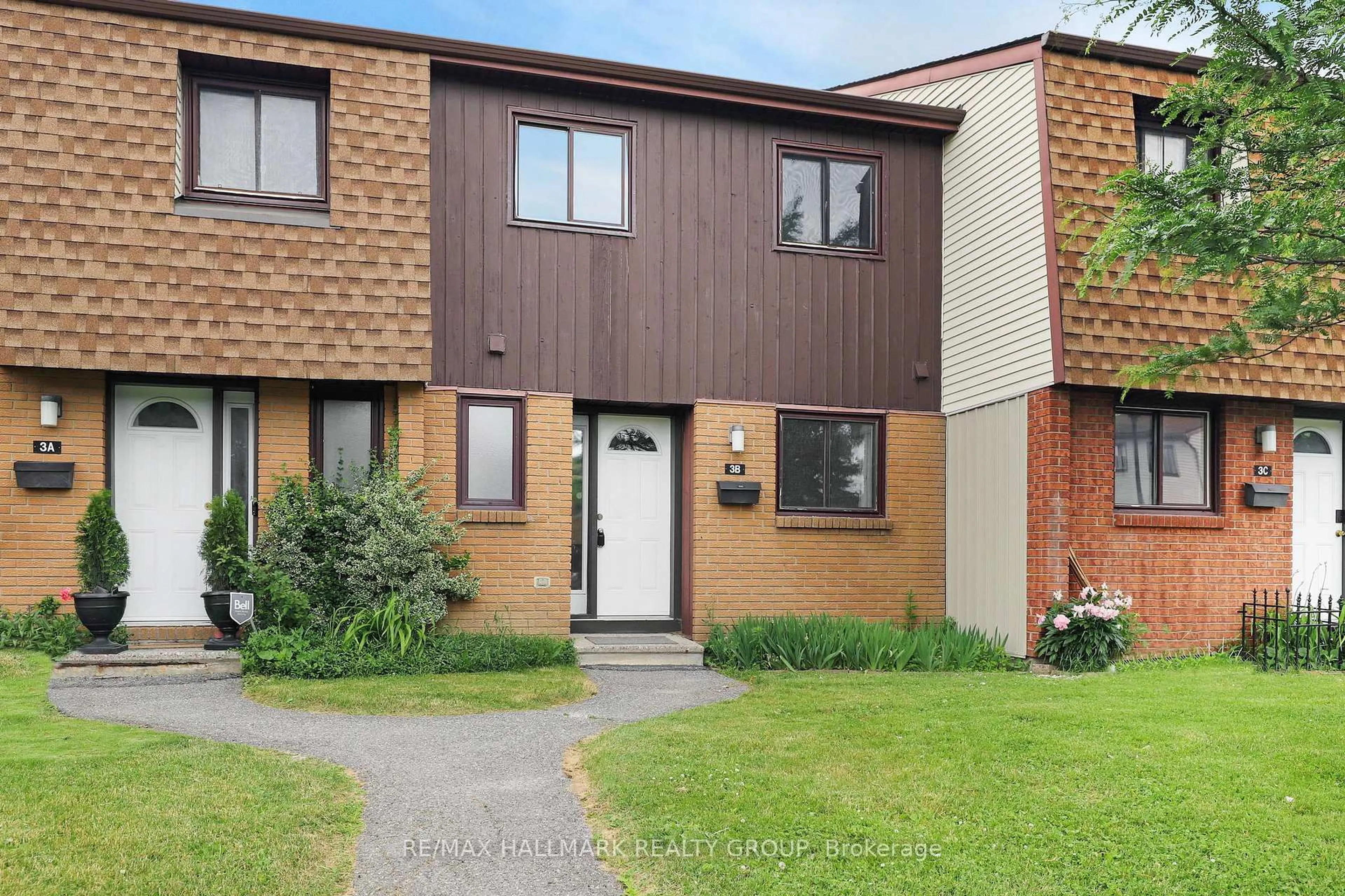 Home with brick exterior material, street for 3B Woodvale Green, Ottawa Ontario K2G 4G9