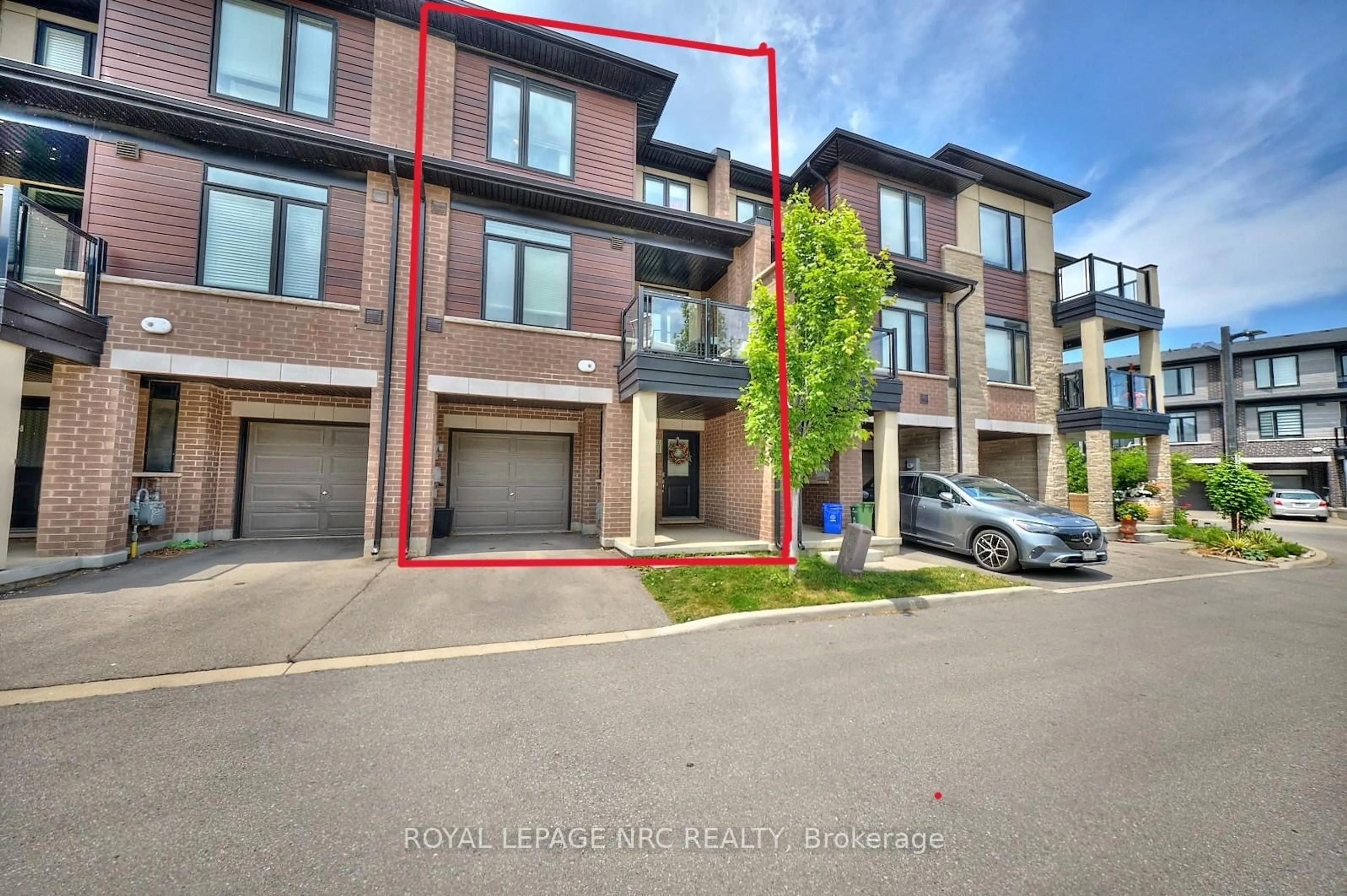 A pic from outside/outdoor area/front of a property/back of a property/a pic from drone, street for 590 North Service Rd #105, Hamilton Ontario L8E 0K5