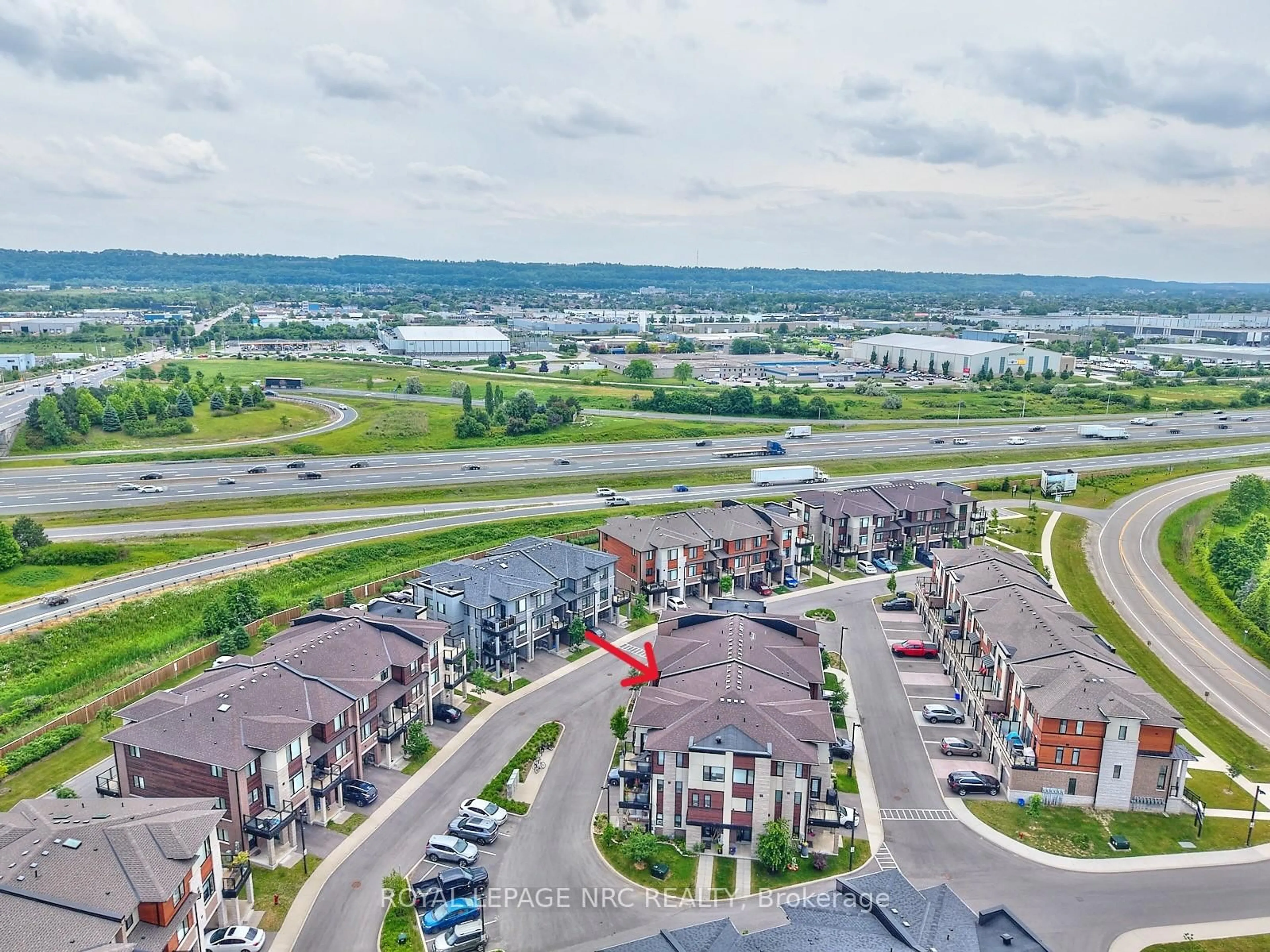 A pic from outside/outdoor area/front of a property/back of a property/a pic from drone, water/lake/river/ocean view for 590 North Service Rd #105, Hamilton Ontario L8E 0K5