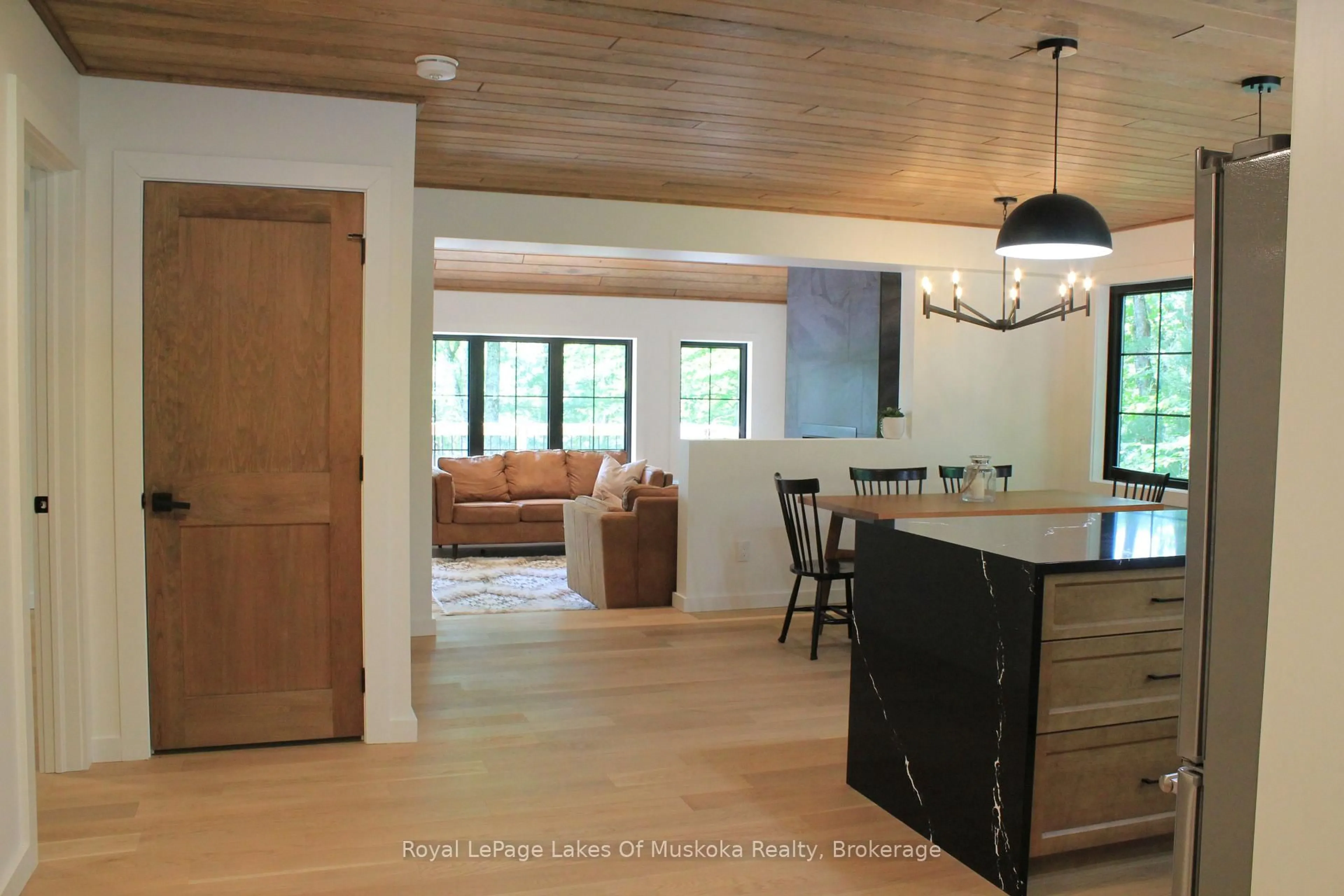 Open concept kitchen, wood/laminate floor for 204 Wurm Rd, Magnetawan Ontario P0A 1P0