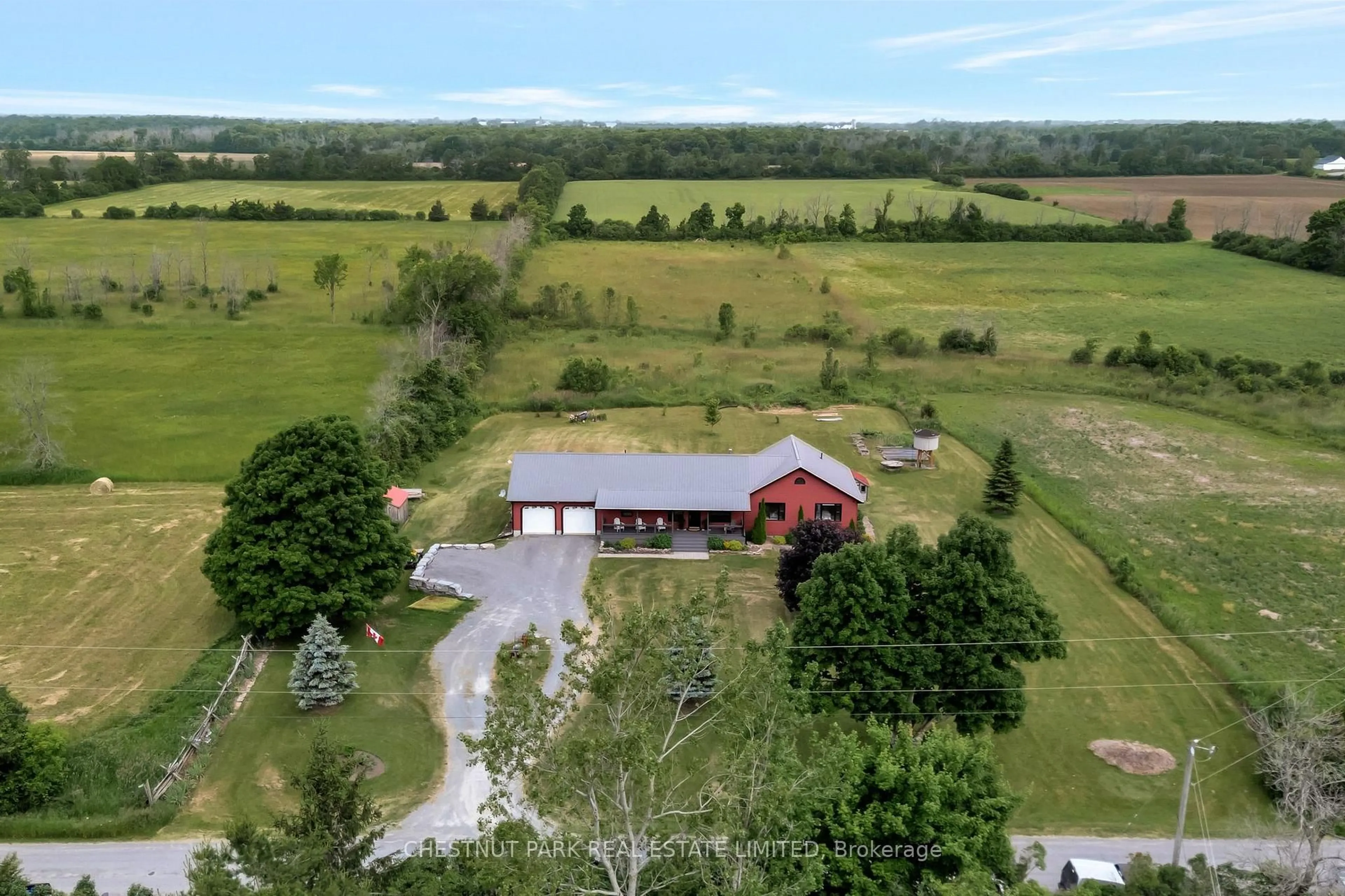 A pic from outside/outdoor area/front of a property/back of a property/a pic from drone, mountain view for 767 Melville Rd, Prince Edward County Ontario K0K 1T0
