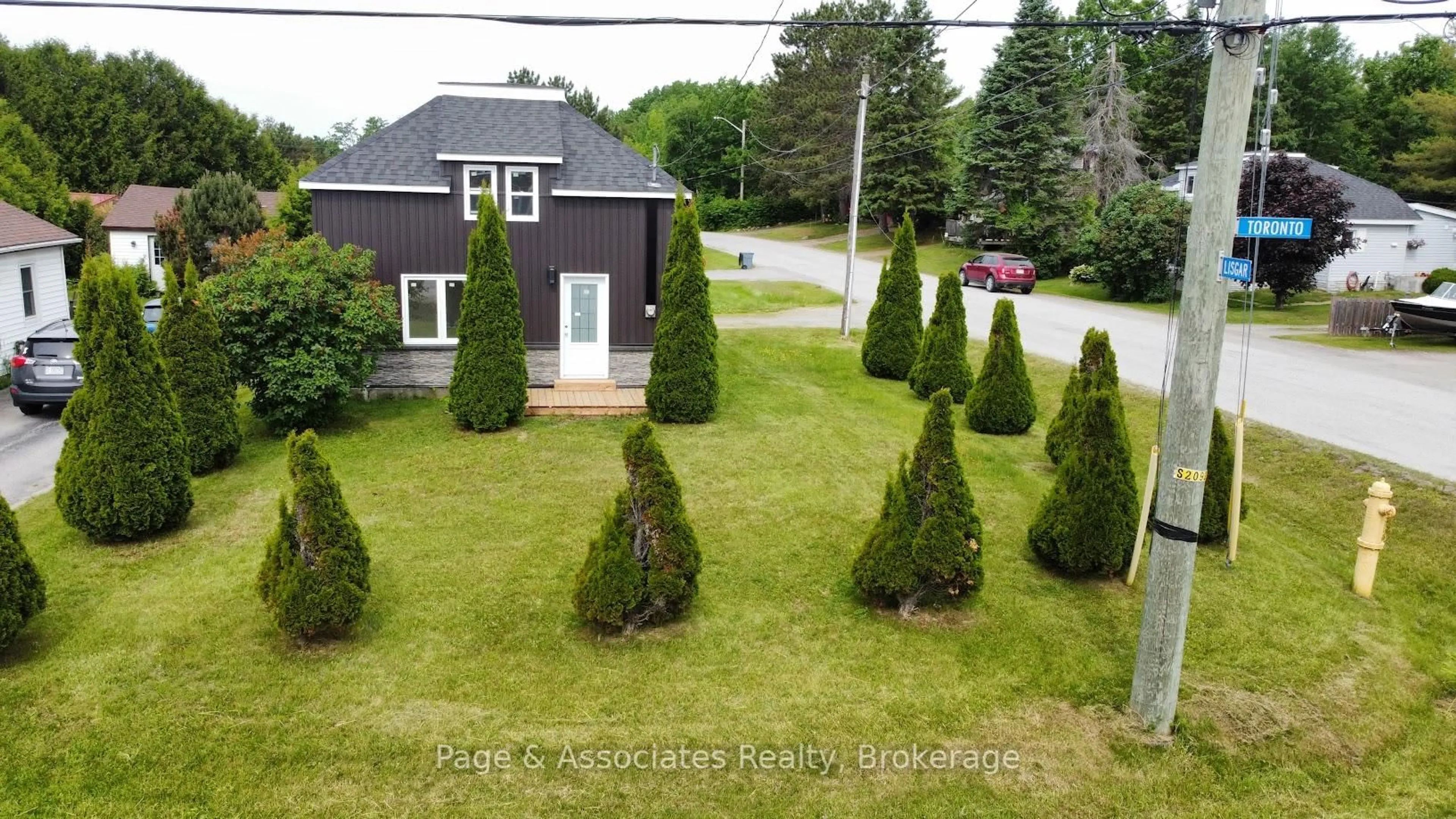 A pic from outside/outdoor area/front of a property/back of a property/a pic from drone, street for 203 Toronto St, West Nipissing Ontario P2B 3J1