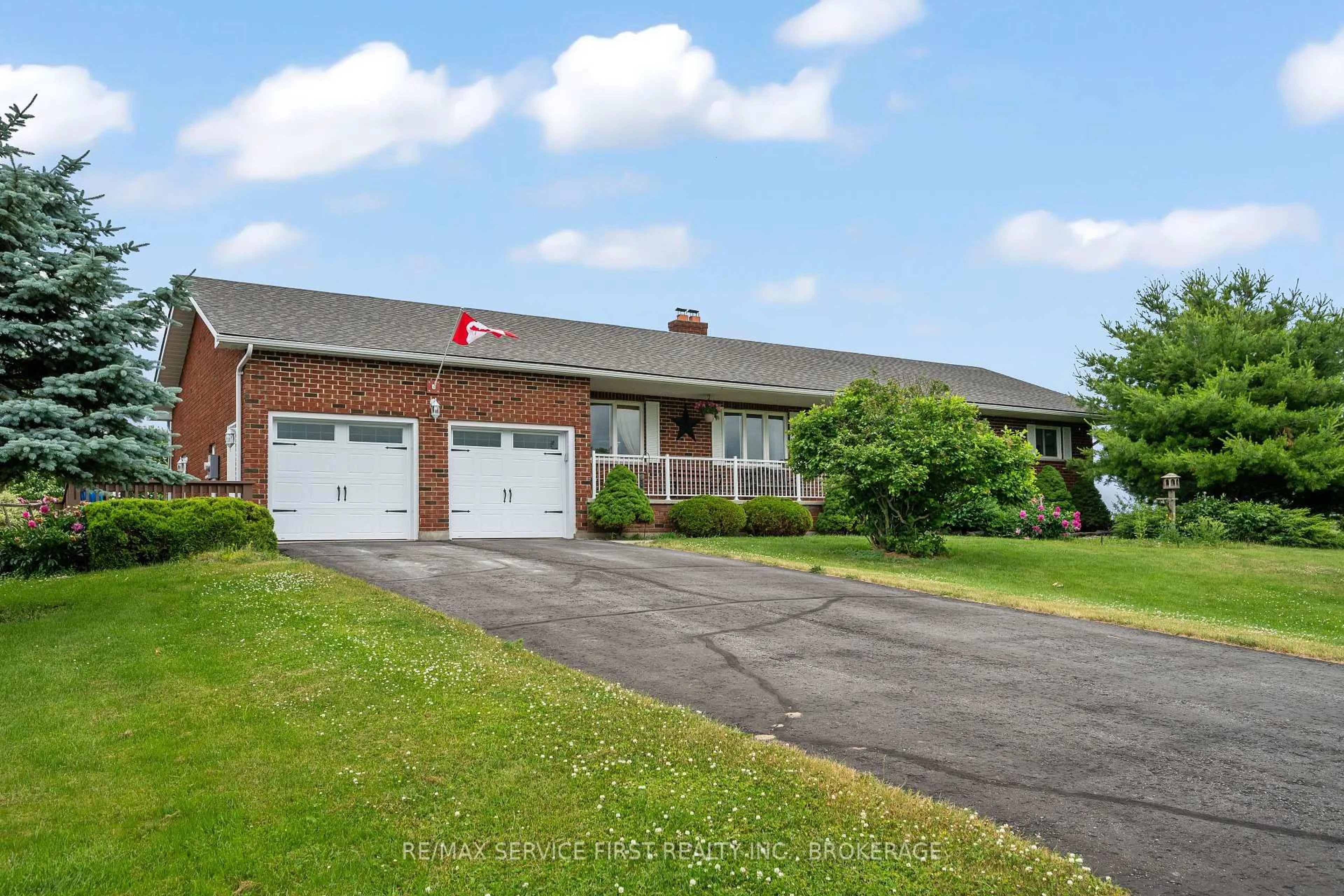 A pic from outside/outdoor area/front of a property/back of a property/a pic from drone, street for 1059 County Rd 11 Rd, Plantagenet Ontario K7R 3L2