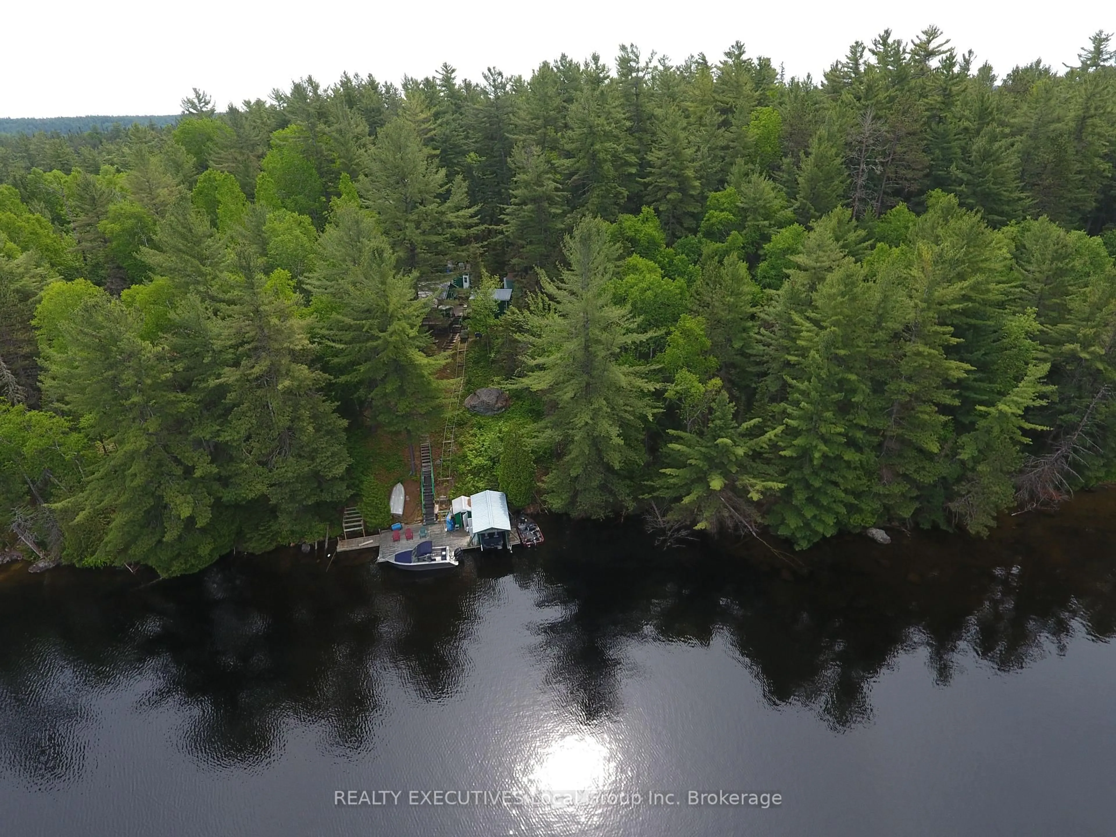 A pic from outside/outdoor area/front of a property/back of a property/a pic from drone, water/lake/river/ocean view for 8 Rabbit Lake Island, Temagami Ontario P0H 2H0