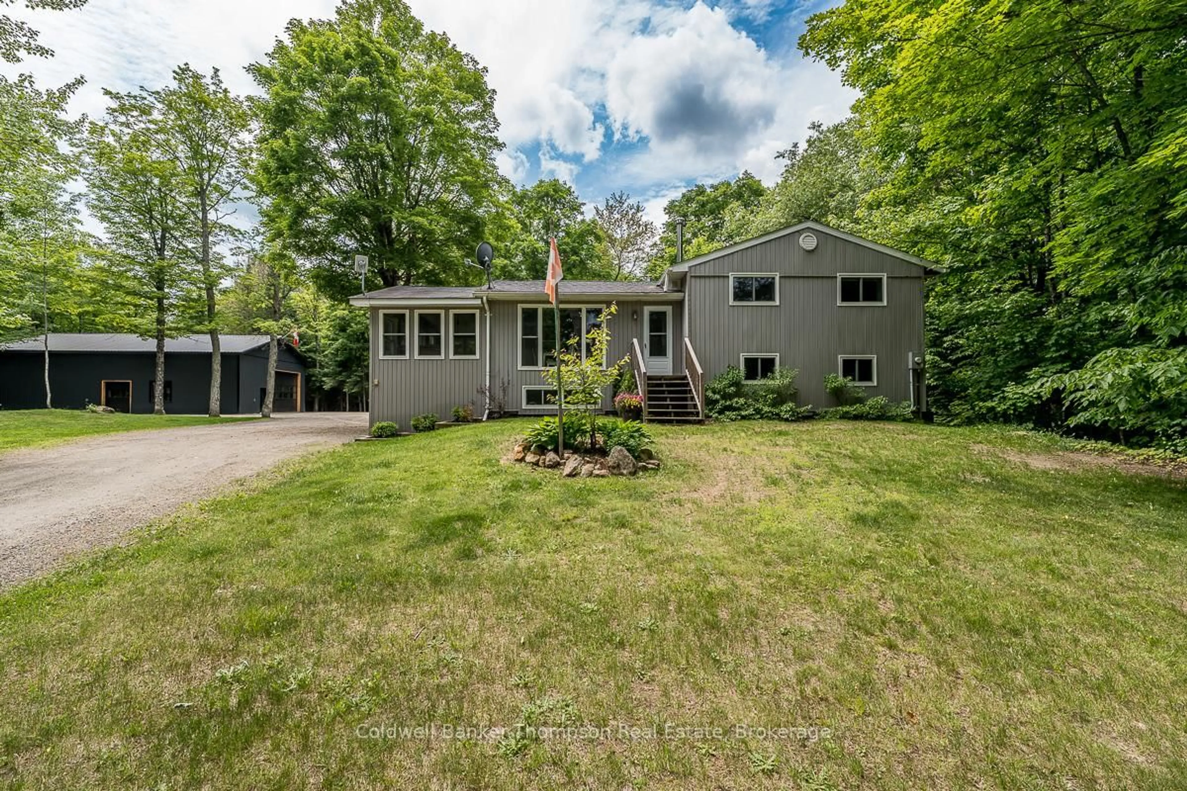 A pic from outside/outdoor area/front of a property/back of a property/a pic from drone, unknown for 1026 592 Highway, Perry Ontario P0A 1J0