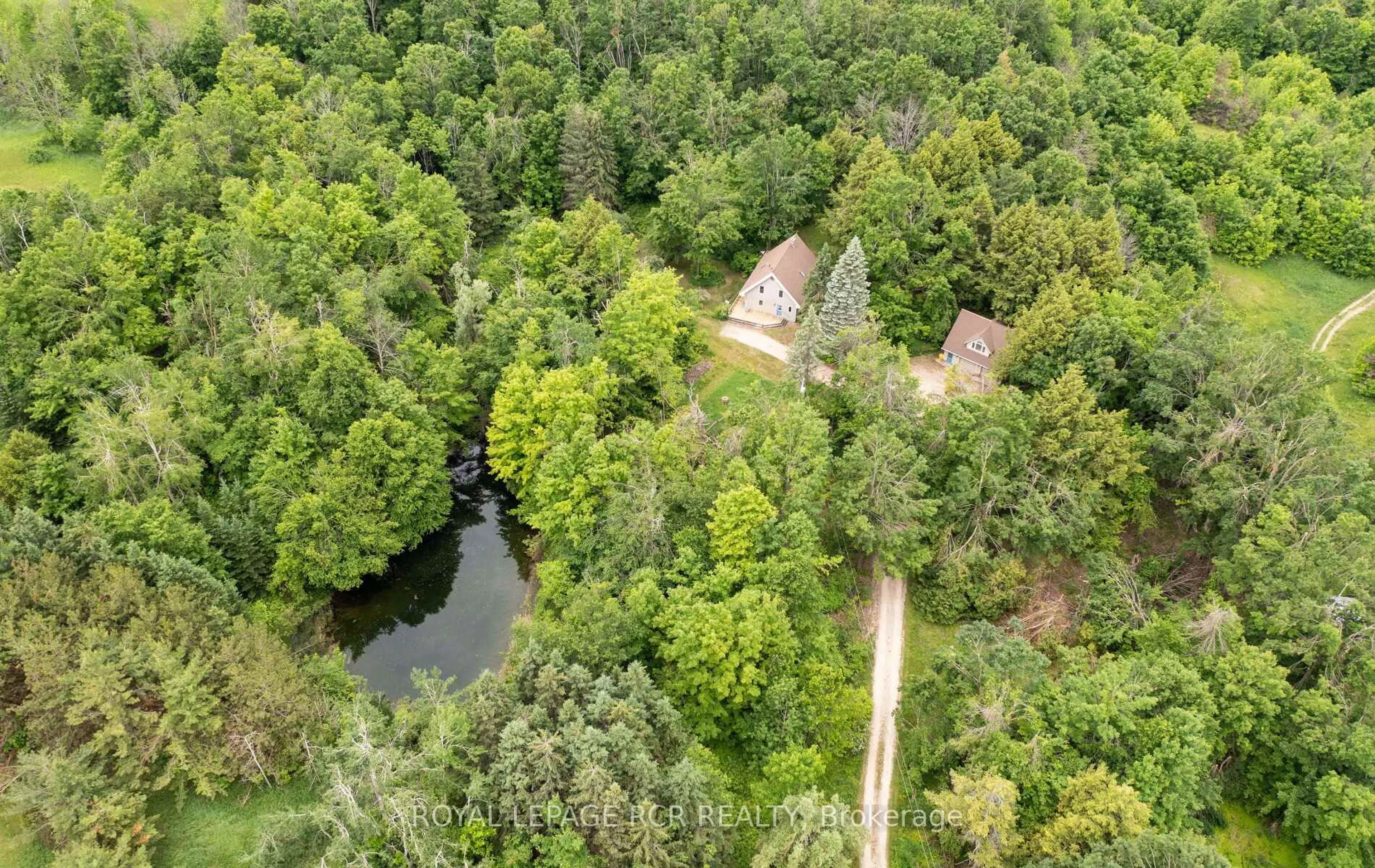 A pic from outside/outdoor area/front of a property/back of a property/a pic from drone, forest/trees view for 757186 2nd Line, Mulmur Ontario L9V 0G7