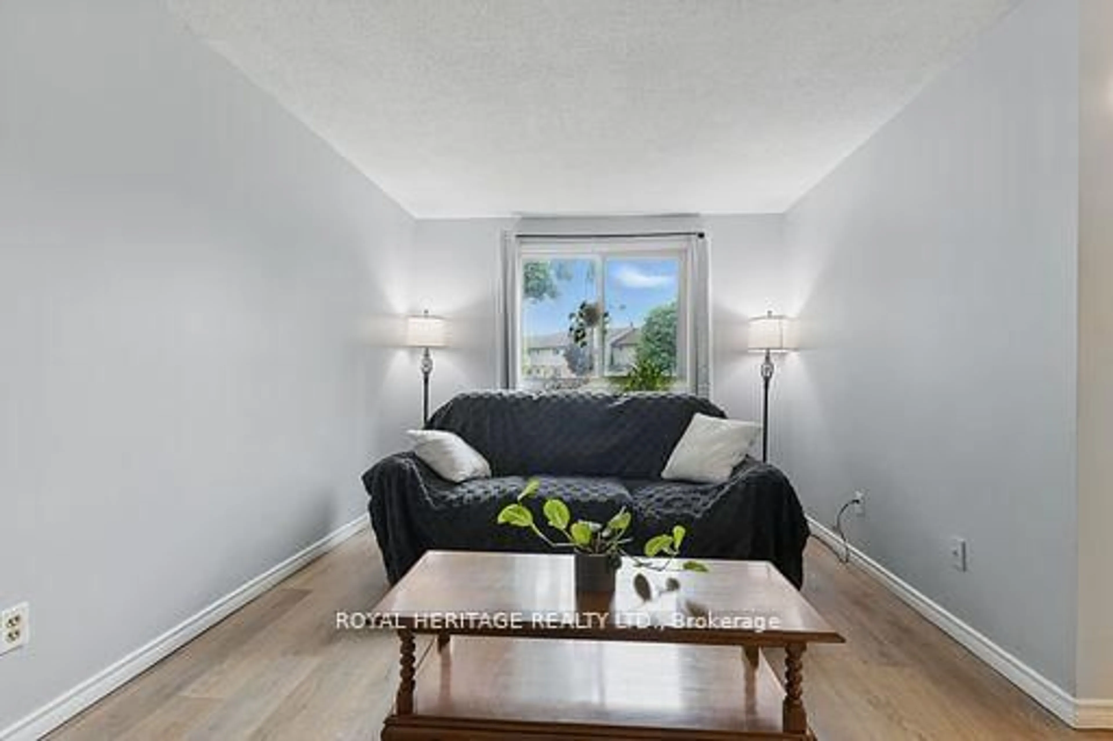 Living room with furniture, wood/laminate floor for 482 Springbank Ave #10, Woodstock Ontario N4T 1K8