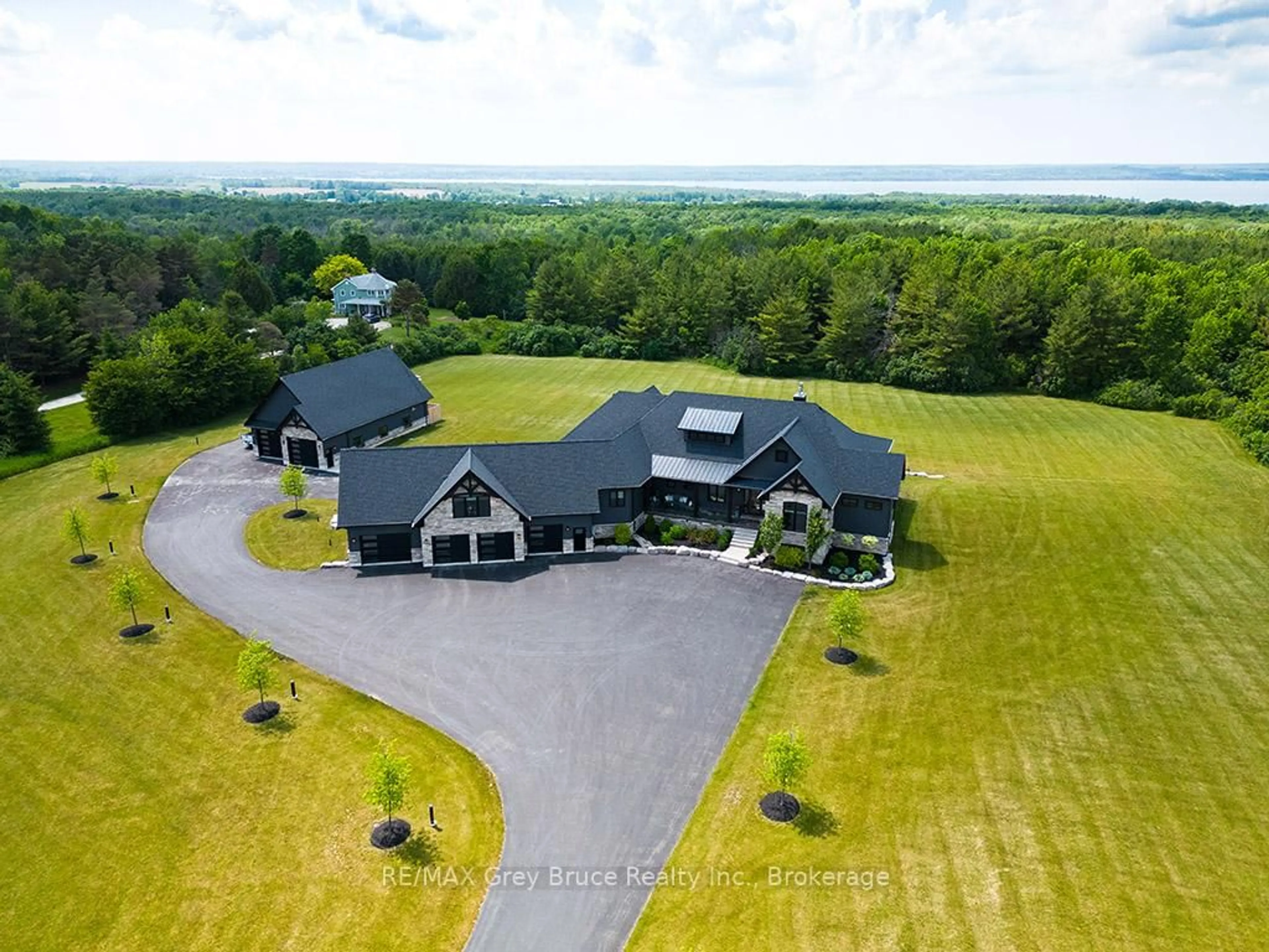 A pic from outside/outdoor area/front of a property/back of a property/a pic from drone, water/lake/river/ocean view for 438800 Grey Road 15 Rd, Meaford Ontario N4K 5N3