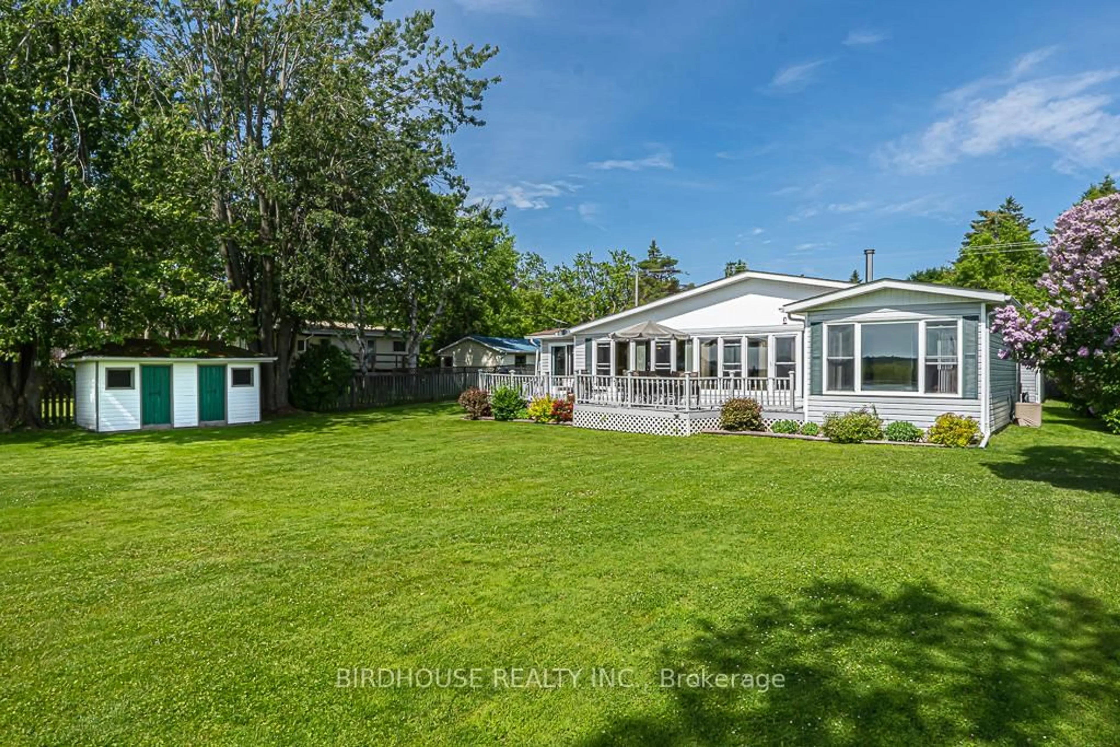 A pic from outside/outdoor area/front of a property/back of a property/a pic from drone, water/lake/river/ocean view for 132 Fenelon Dr, Kawartha Lakes Ontario K0M 1G0