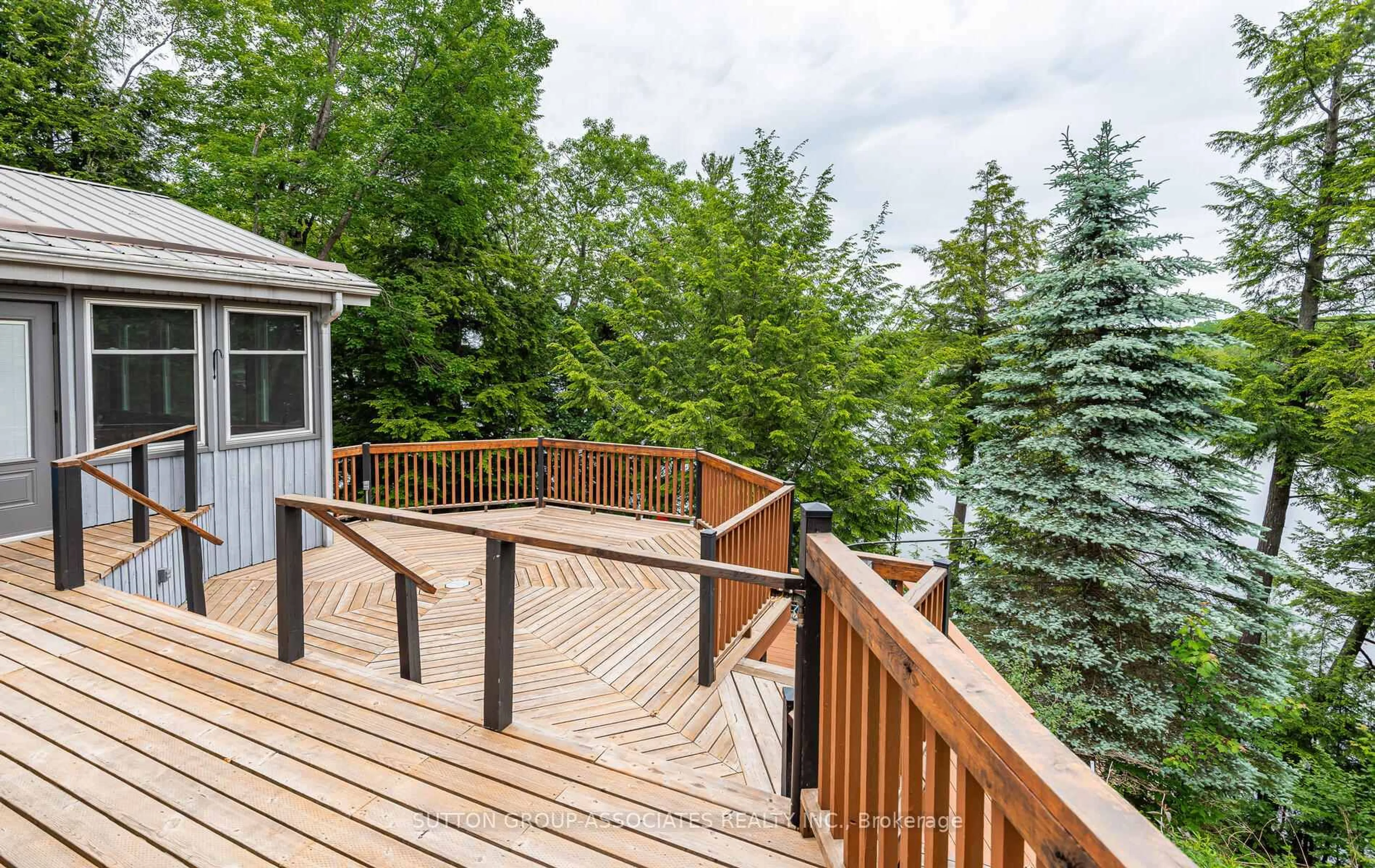 Patio, forest/trees view for 1105 Butterfly Rd #5, Muskoka Lakes Ontario P0B 1J0