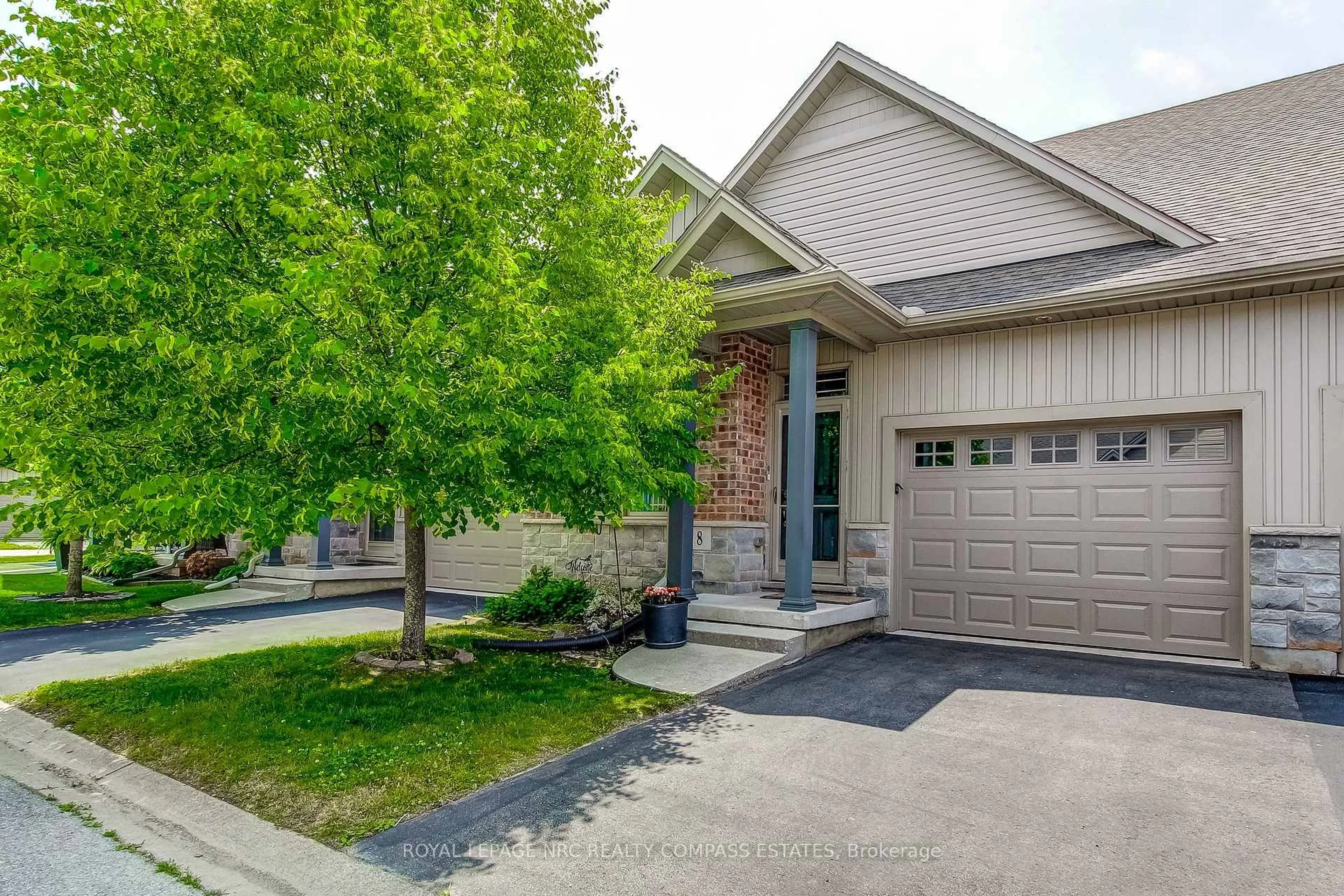 Home with brick exterior material, street for 5490 Prince Edward Ave #8, Niagara Falls Ontario L2G 0G5