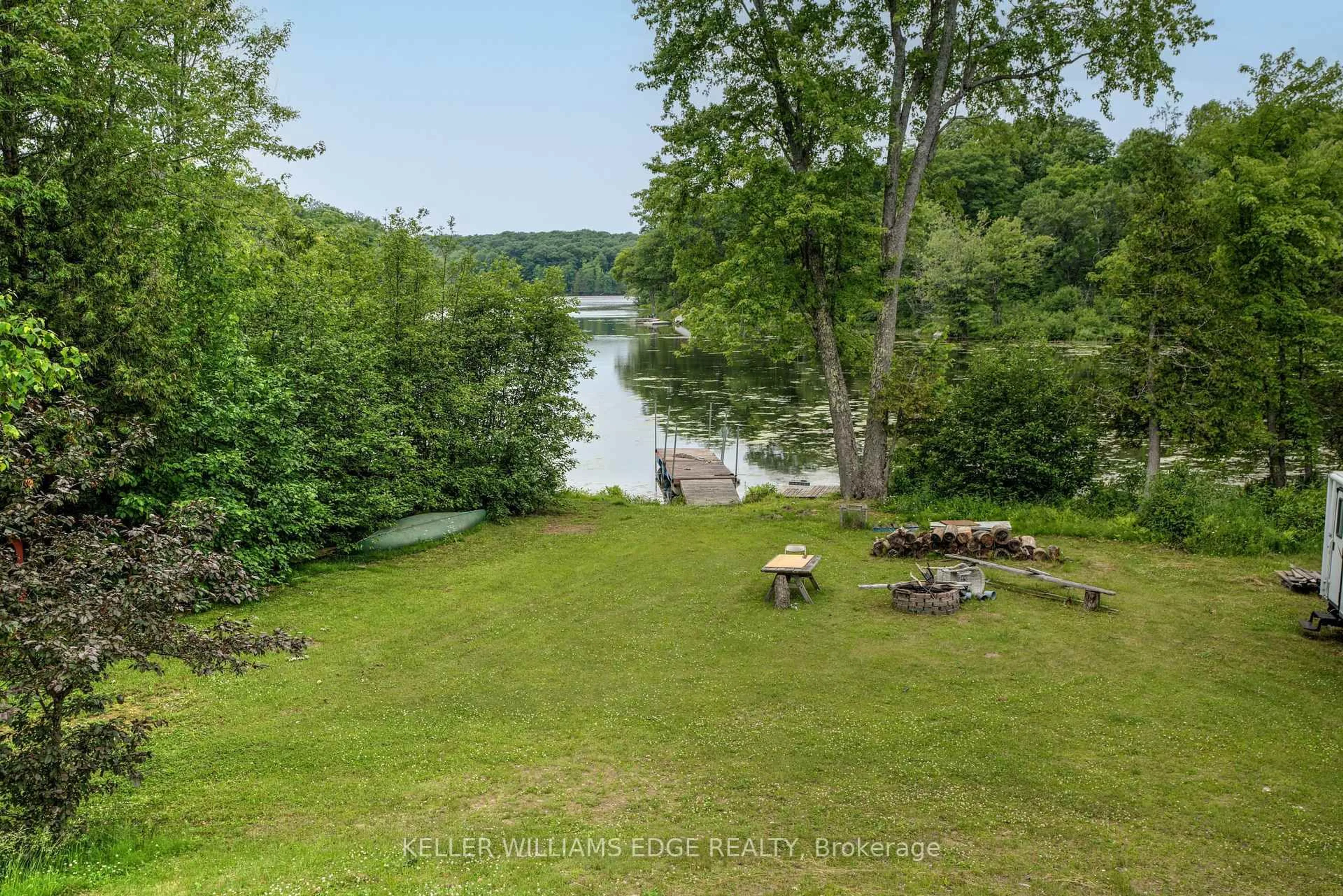 A pic from outside/outdoor area/front of a property/back of a property/a pic from drone, water/lake/river/ocean view for 1180 Guigue Rd, Sharbot Lake Ontario K0H 2P0