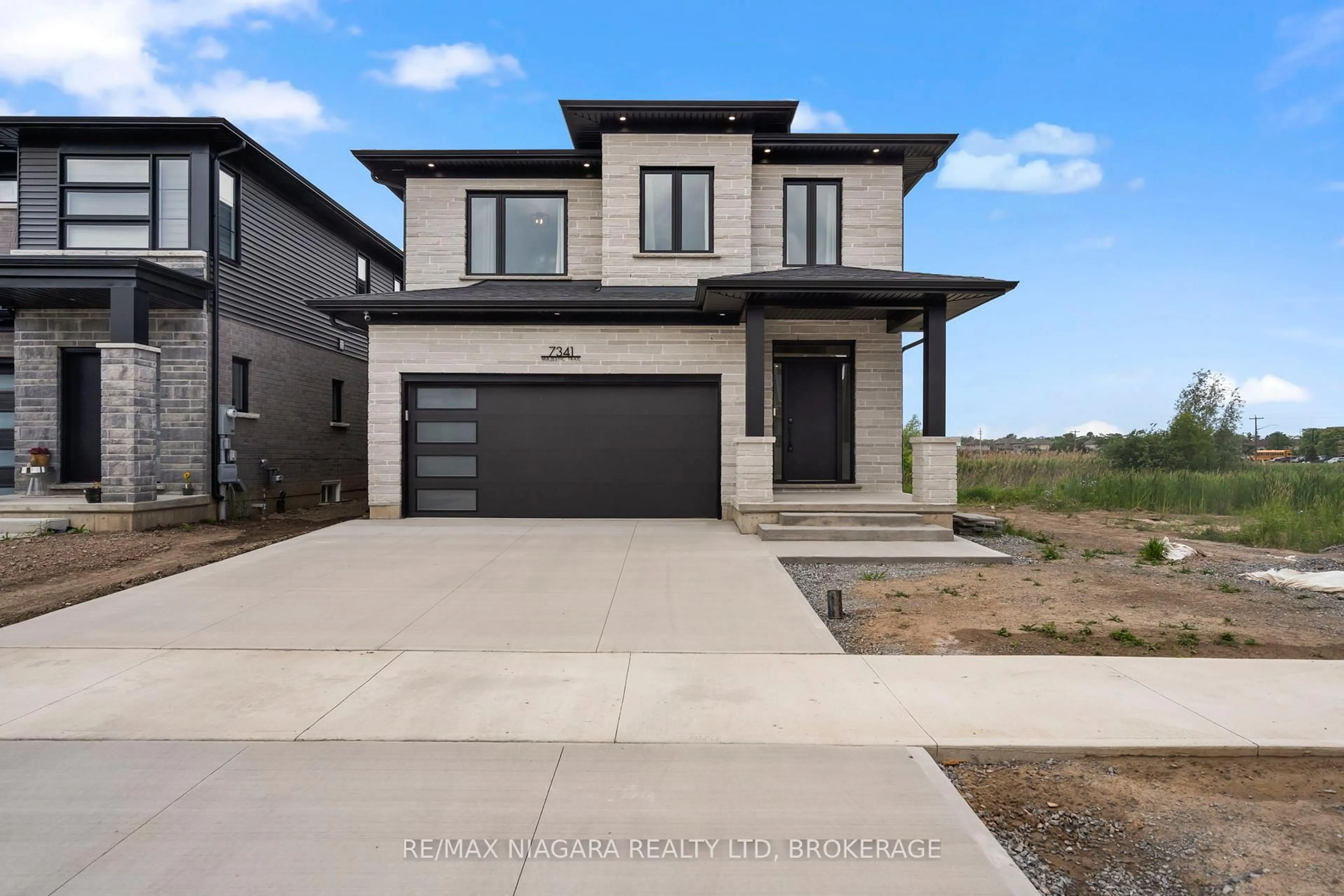 Home with brick exterior material, street for 7341 Majestic Tr, Niagara Falls Ontario L2H 0K7