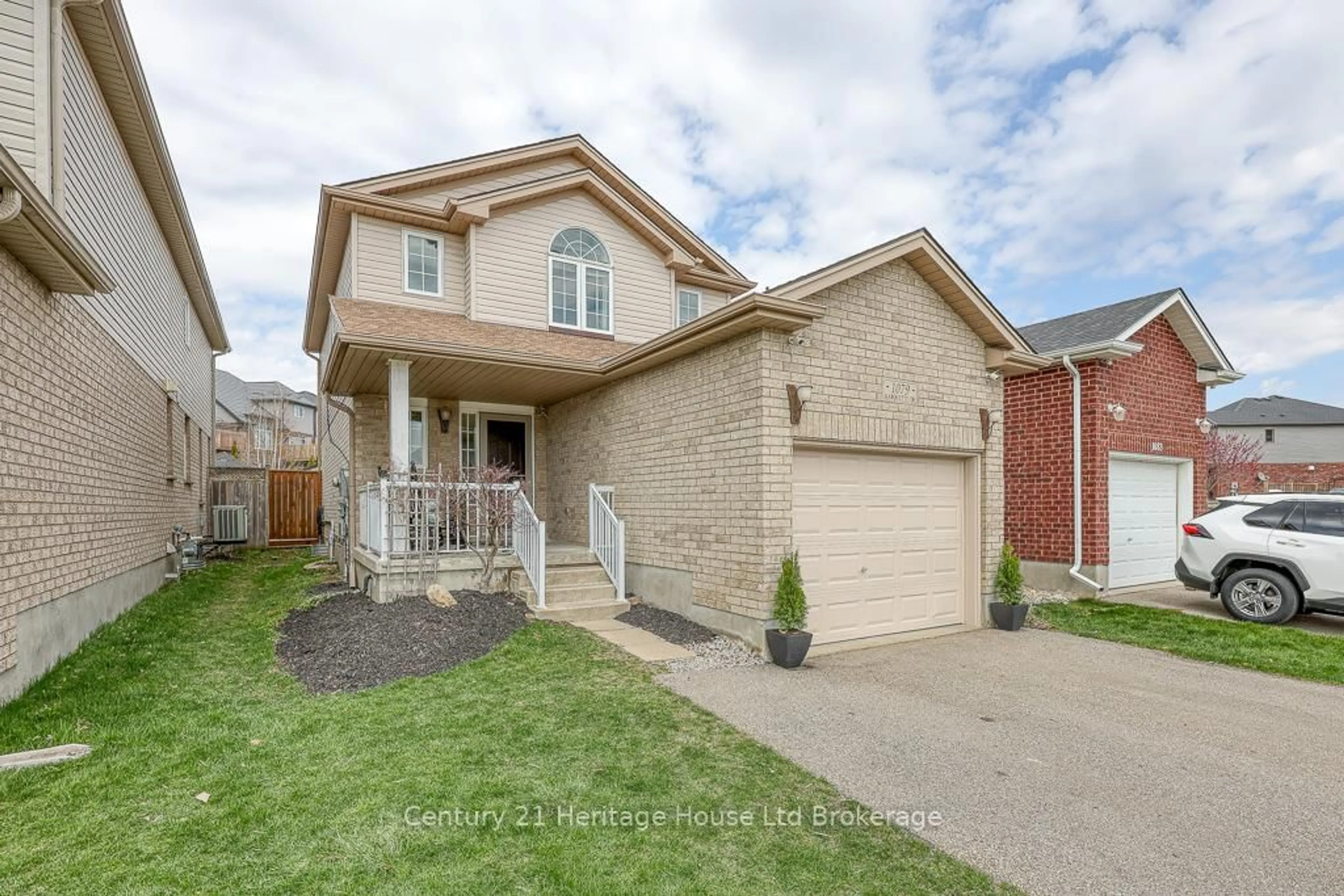 Home with brick exterior material, street for 1079 Marquette Dr, Woodstock Ontario N4V 0A9