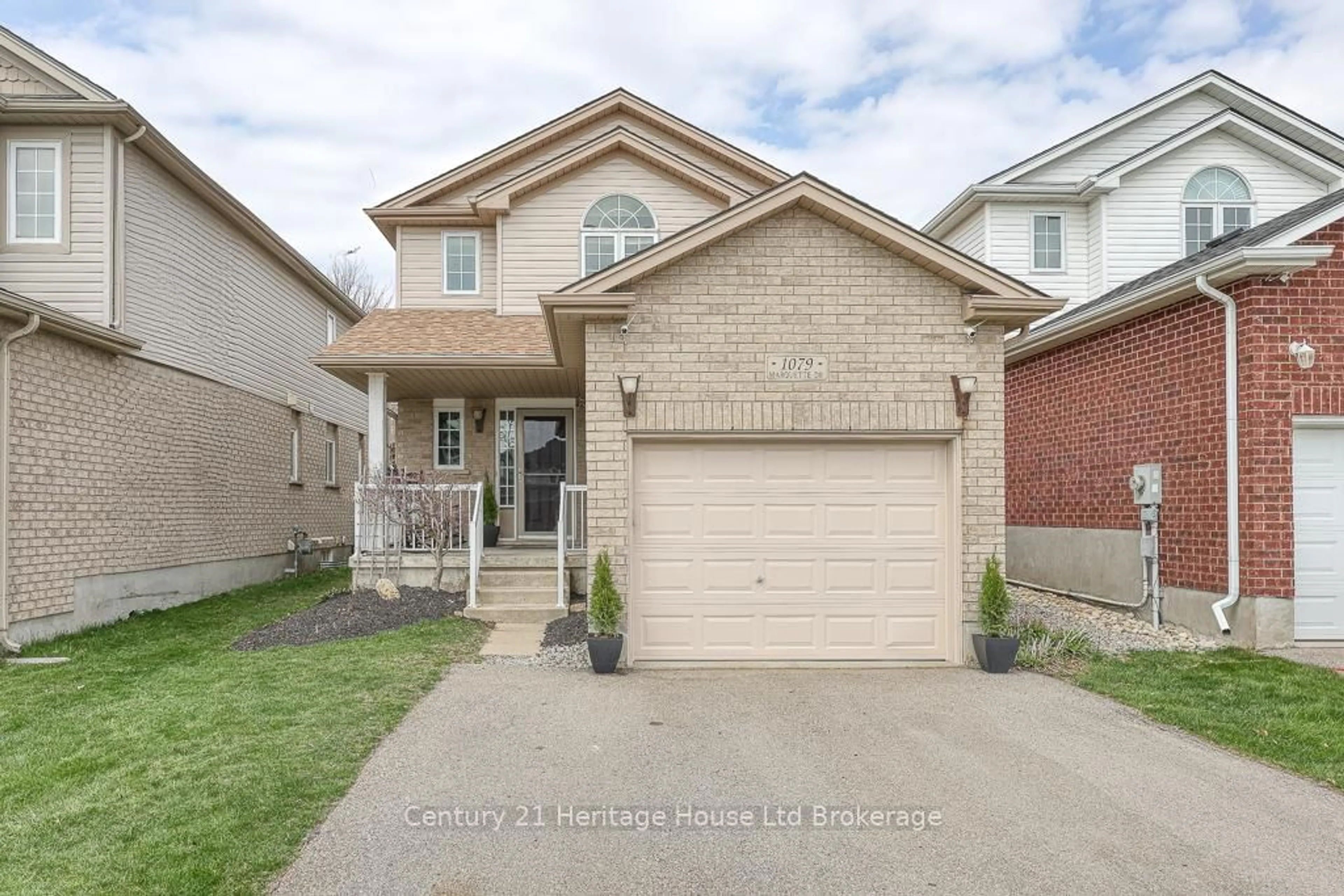 Home with brick exterior material, street for 1079 Marquette Dr, Woodstock Ontario N4V 0A9