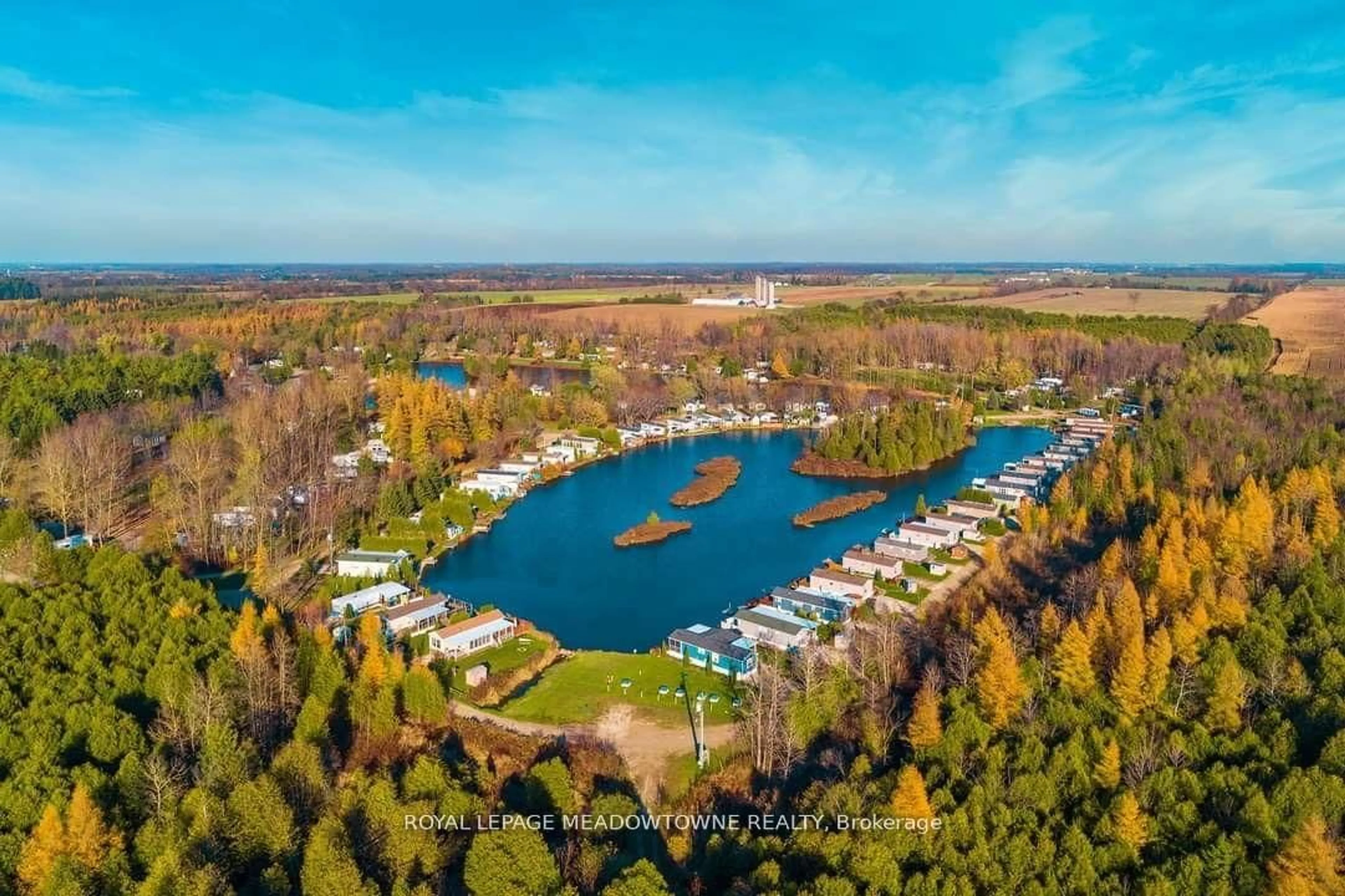 A pic from outside/outdoor area/front of a property/back of a property/a pic from drone, water/lake/river/ocean view for 8 Grand  Vista Dr, Wellington North Ontario N0G 2L0