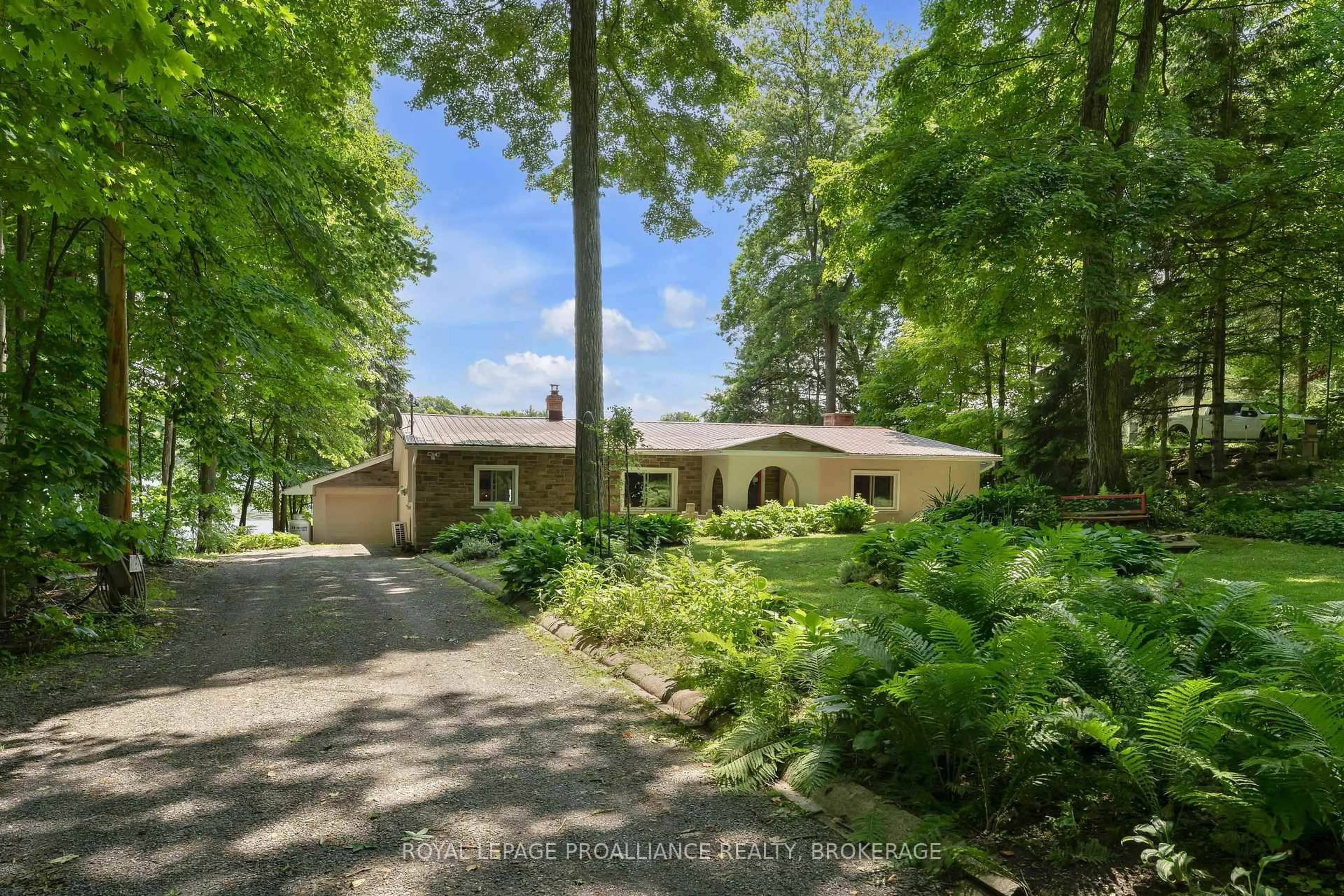A pic from outside/outdoor area/front of a property/back of a property/a pic from drone, forest/trees view for 4268 Melody Lodge Lane, Seeley's Bay Ontario K0H 2N0
