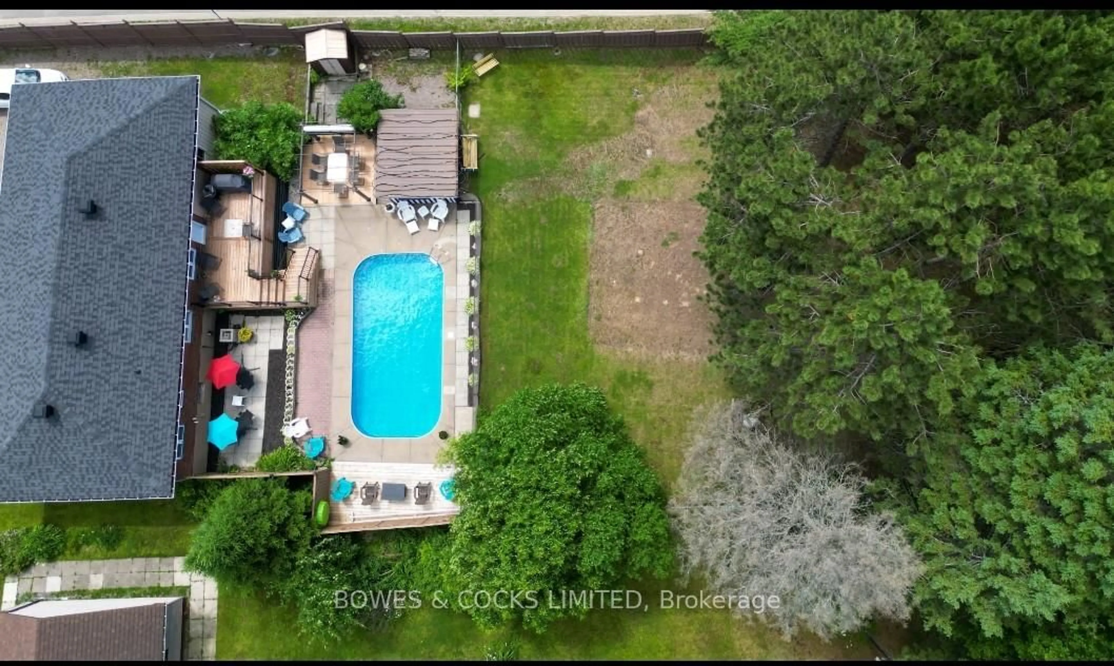 A pic from outside/outdoor area/front of a property/back of a property/a pic from drone, water/lake/river/ocean view for 99 Maple St, Bancroft Ontario K0L 1C0