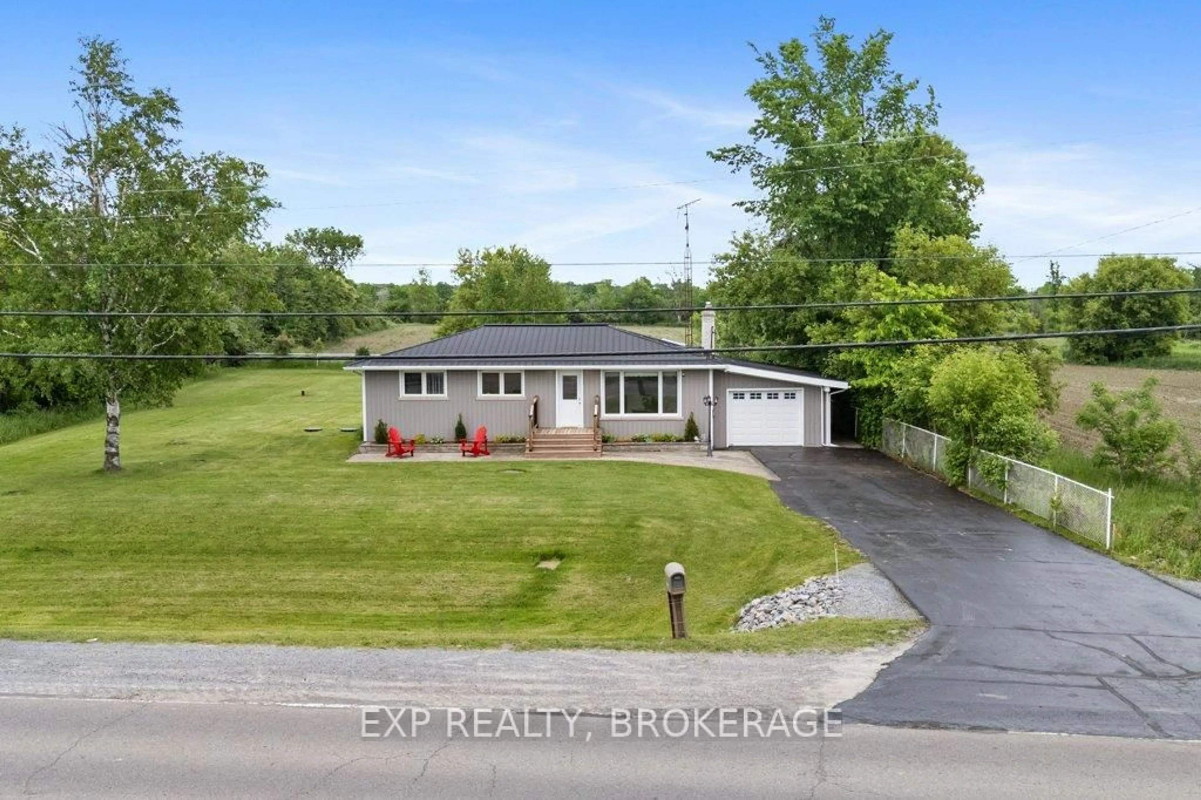 A pic from outside/outdoor area/front of a property/back of a property/a pic from drone, street for 5086 Highway 38, Harrowsmith Ontario K0H 1V0