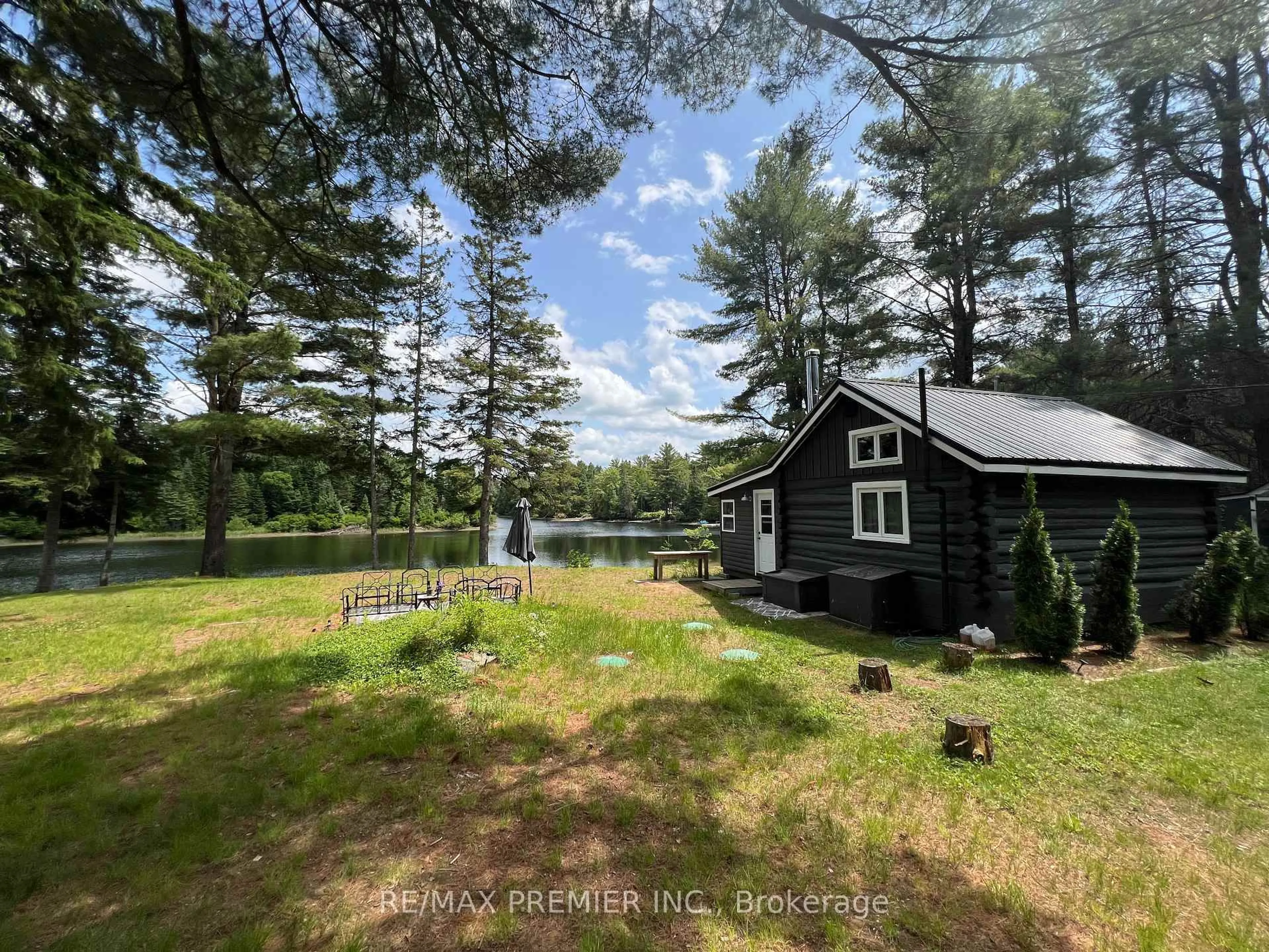 A pic from outside/outdoor area/front of a property/back of a property/a pic from drone, water/lake/river/ocean view for 1130 Colony Rd, Lake of Bays Ontario P1L 1X3