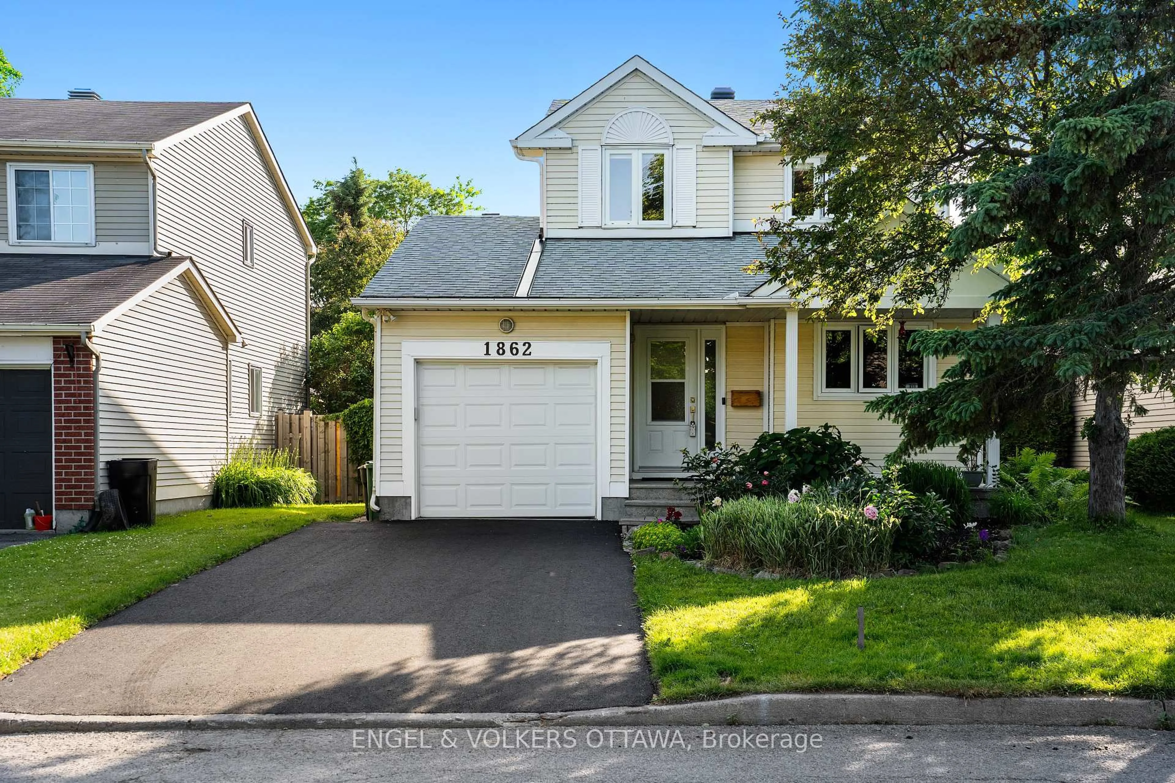 Home with vinyl exterior material, street for 1862 Windflower Way, Ottawa Ontario K1C 6A3