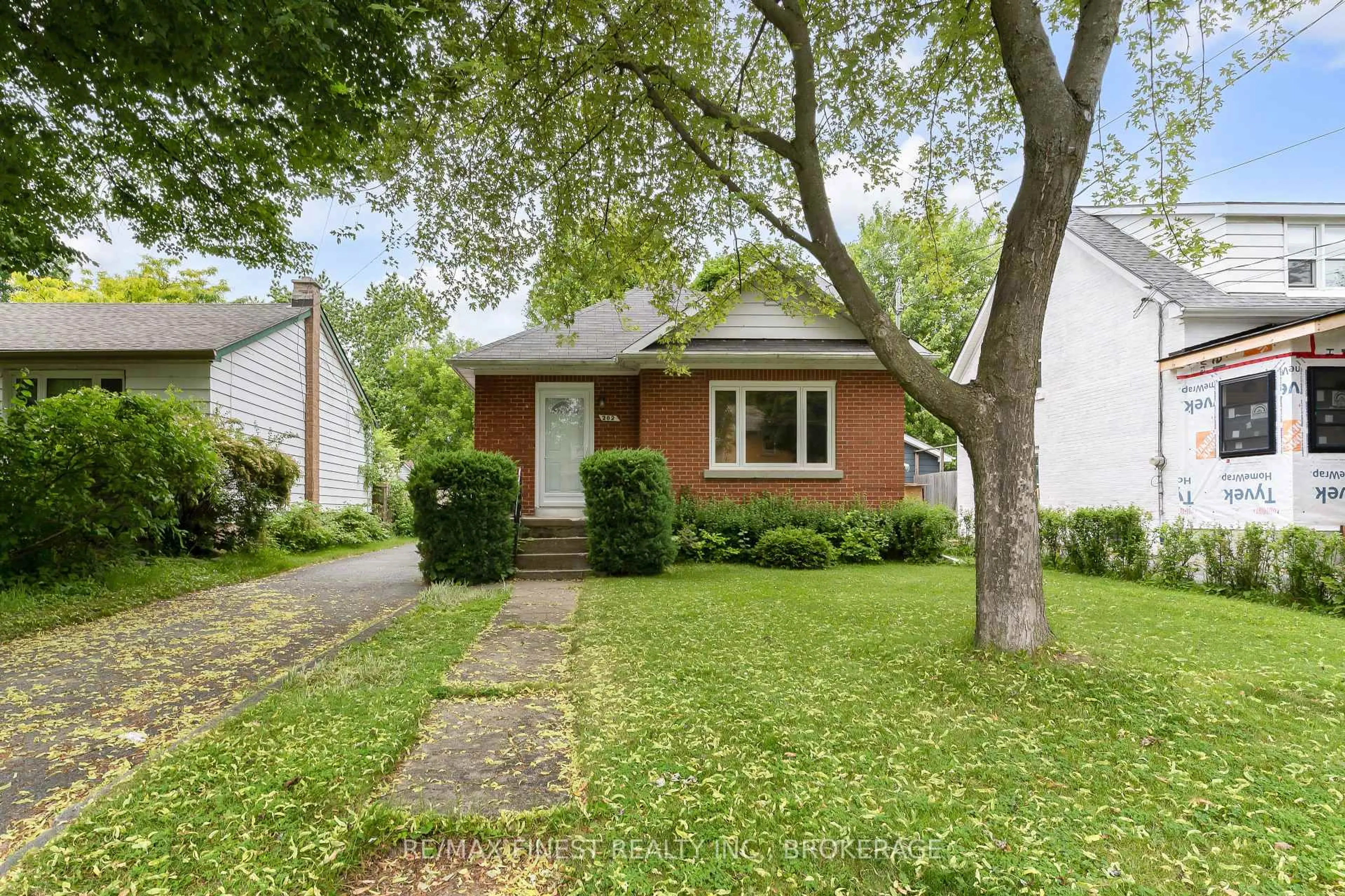 Home with brick exterior material, street for 202 Helen St, Kingston Ontario K7L 4P4