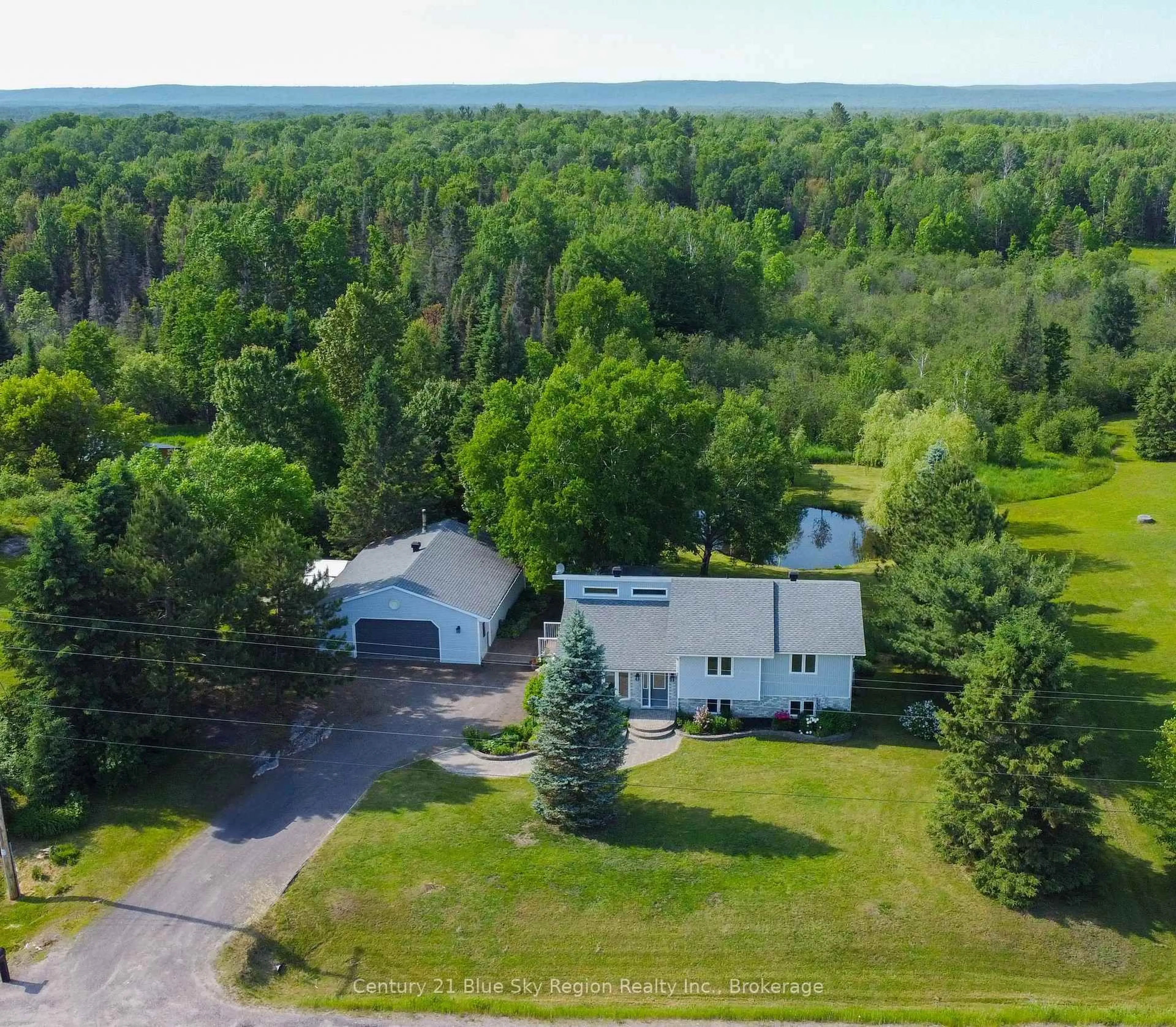 A pic from outside/outdoor area/front of a property/back of a property/a pic from drone, unknown for 780 Highway 94, East Ferris Ontario P0H 1K0