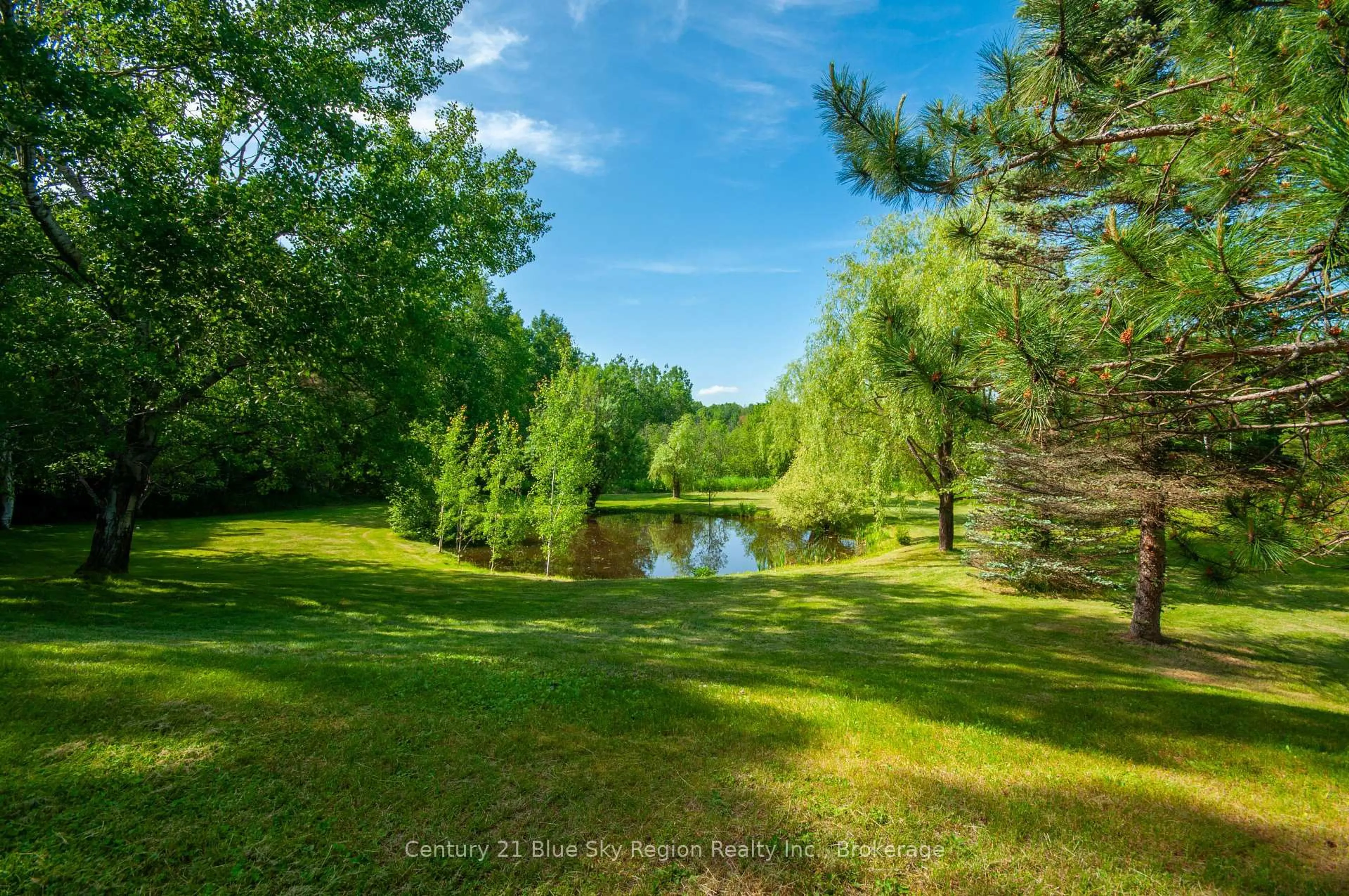 A pic from outside/outdoor area/front of a property/back of a property/a pic from drone, water/lake/river/ocean view for 780 Highway 94, East Ferris Ontario P0H 1K0