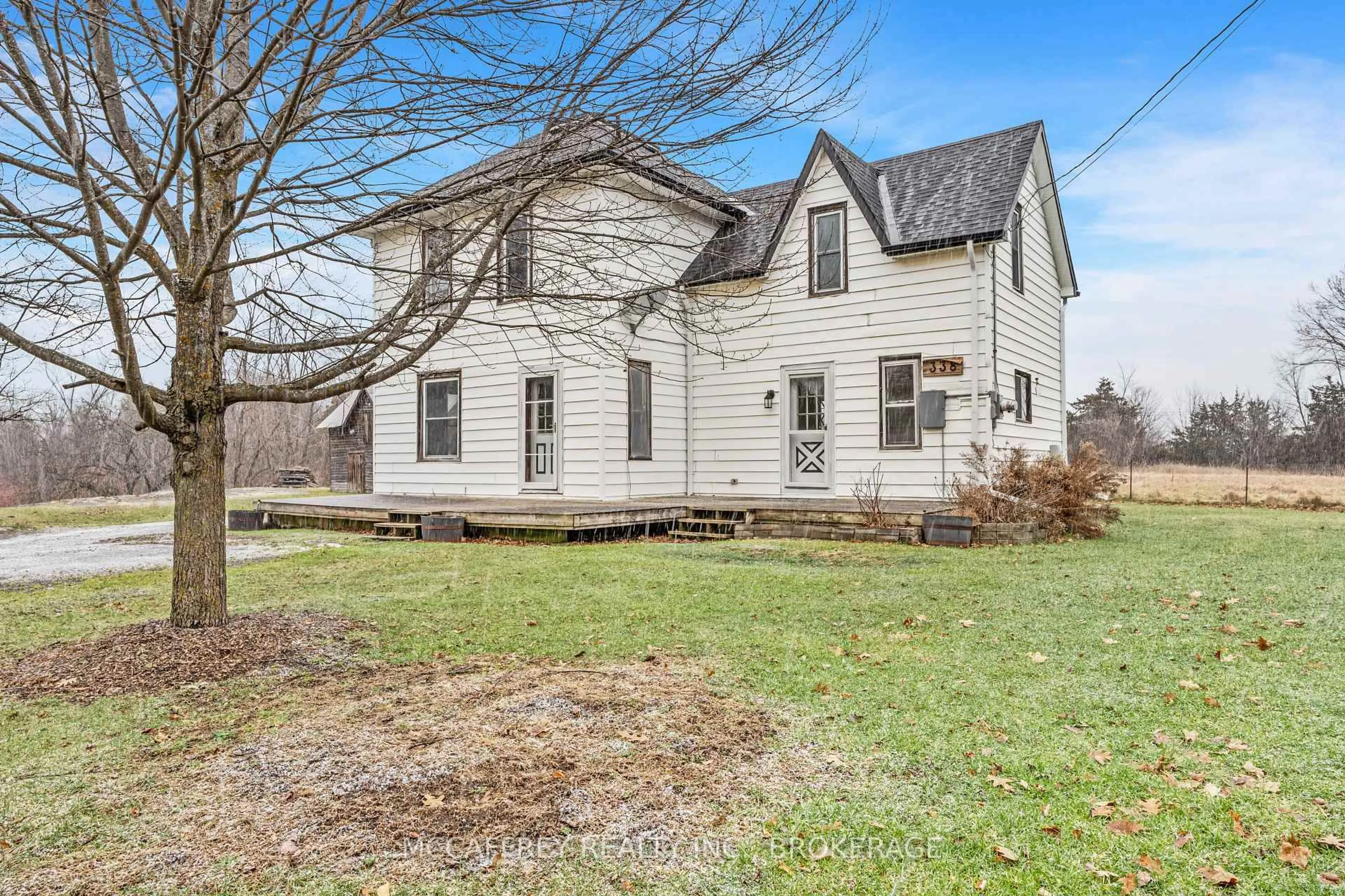A pic from outside/outdoor area/front of a property/back of a property/a pic from drone, street for 338 Burridge Rd, Godfrey Ontario K0H 1T0