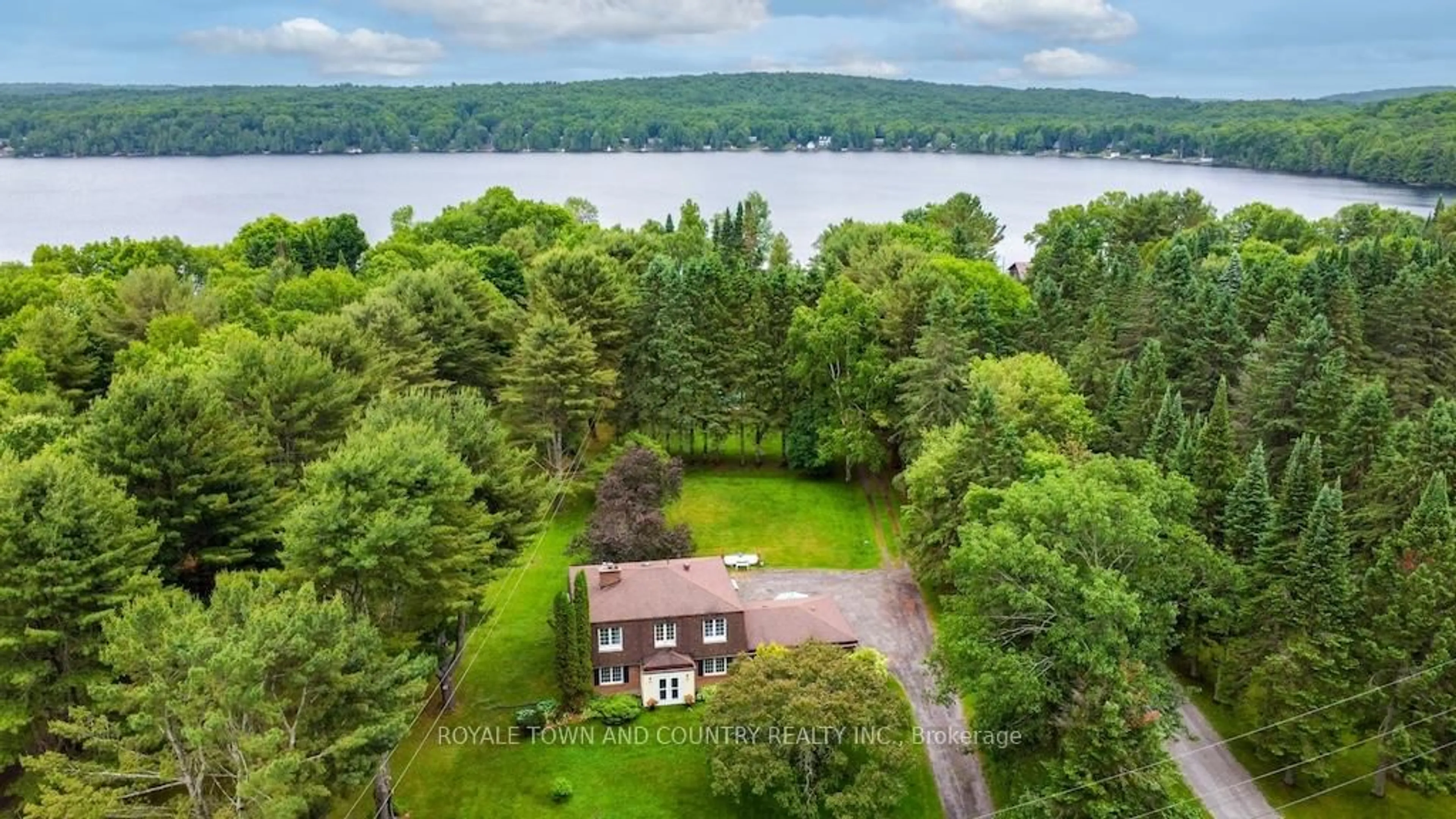 A pic from outside/outdoor area/front of a property/back of a property/a pic from drone, water/lake/river/ocean view for 1304 North Shore Rd, Algonquin Highlands Ontario K0M 1S0