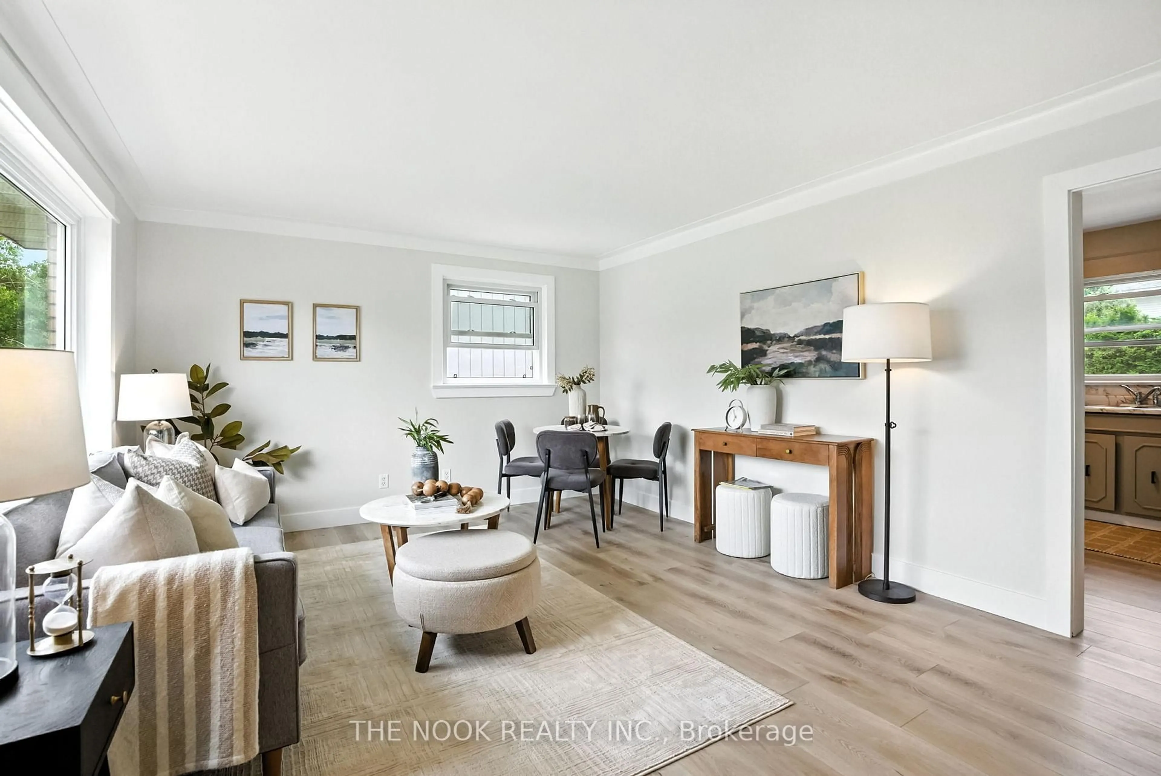 Living room with furniture, wood/laminate floor for 23 Hyde Park Ave, Belleville Ontario K8N 2K1