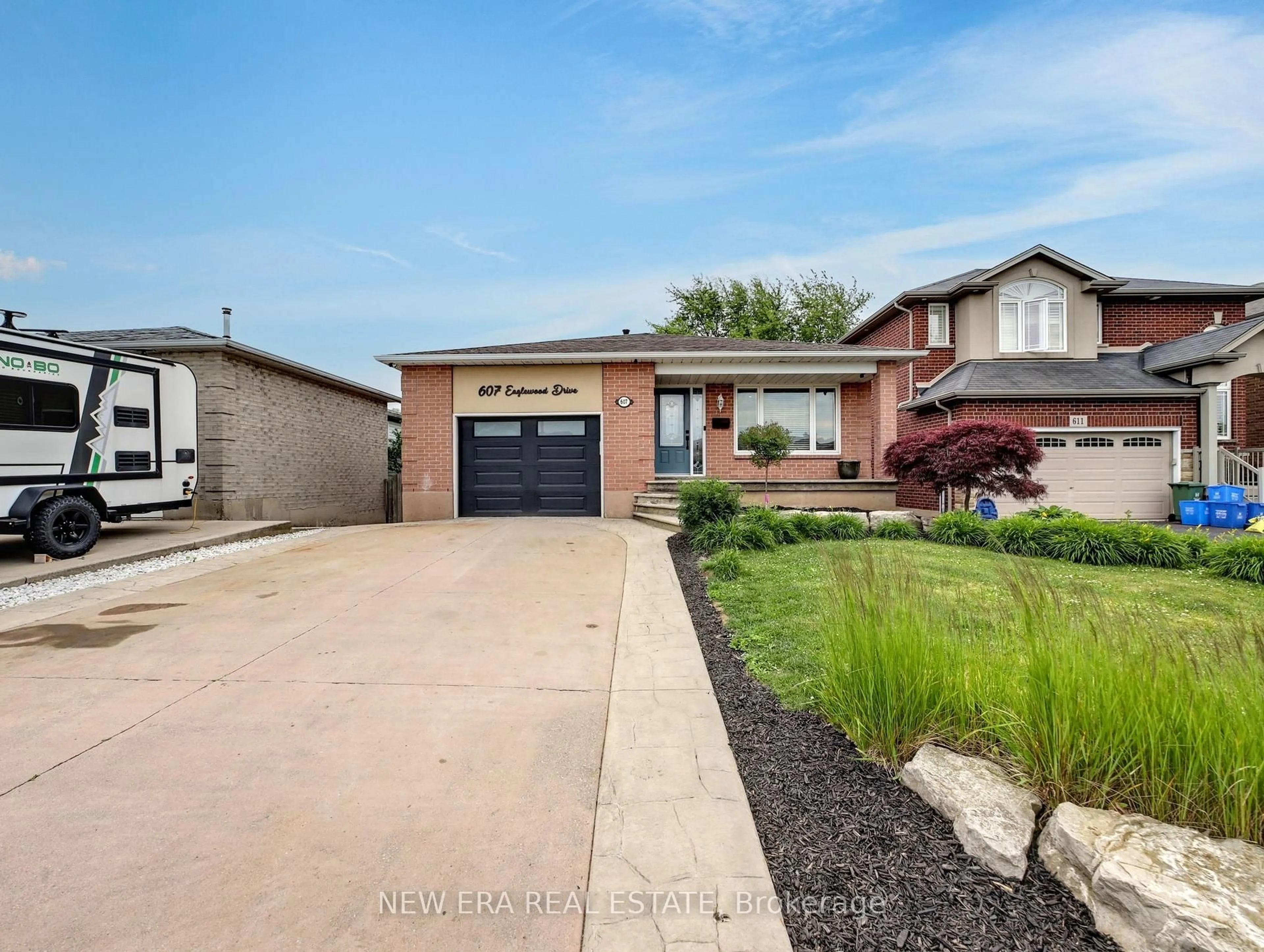 Home with brick exterior material, street for 607 Eaglewood Dr, Hamilton Ontario L8W 3J8