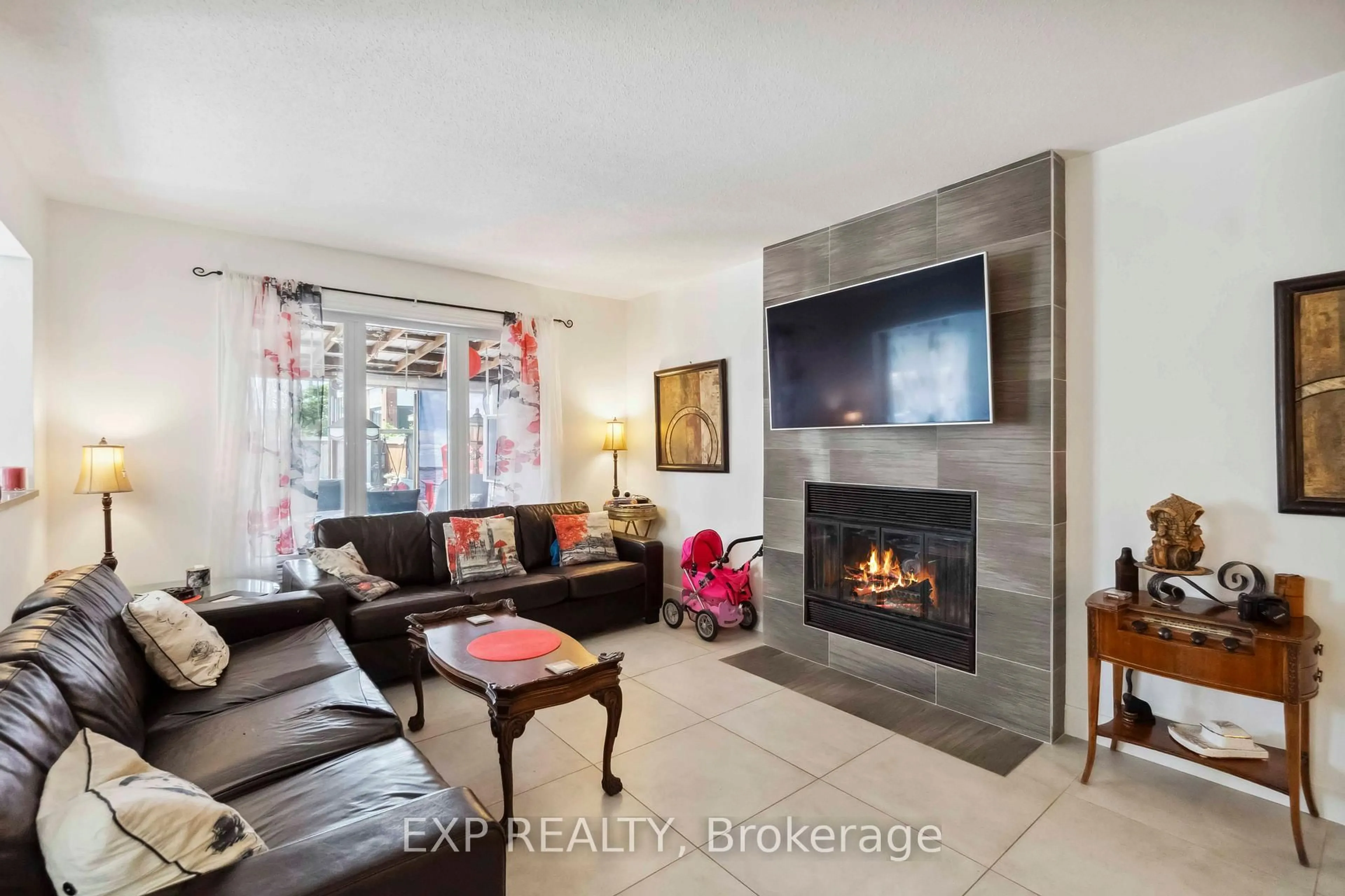Living room with furniture, ceramic/tile floor for 2092 Legrand Cres, Ottawa Ontario K1E 3T6