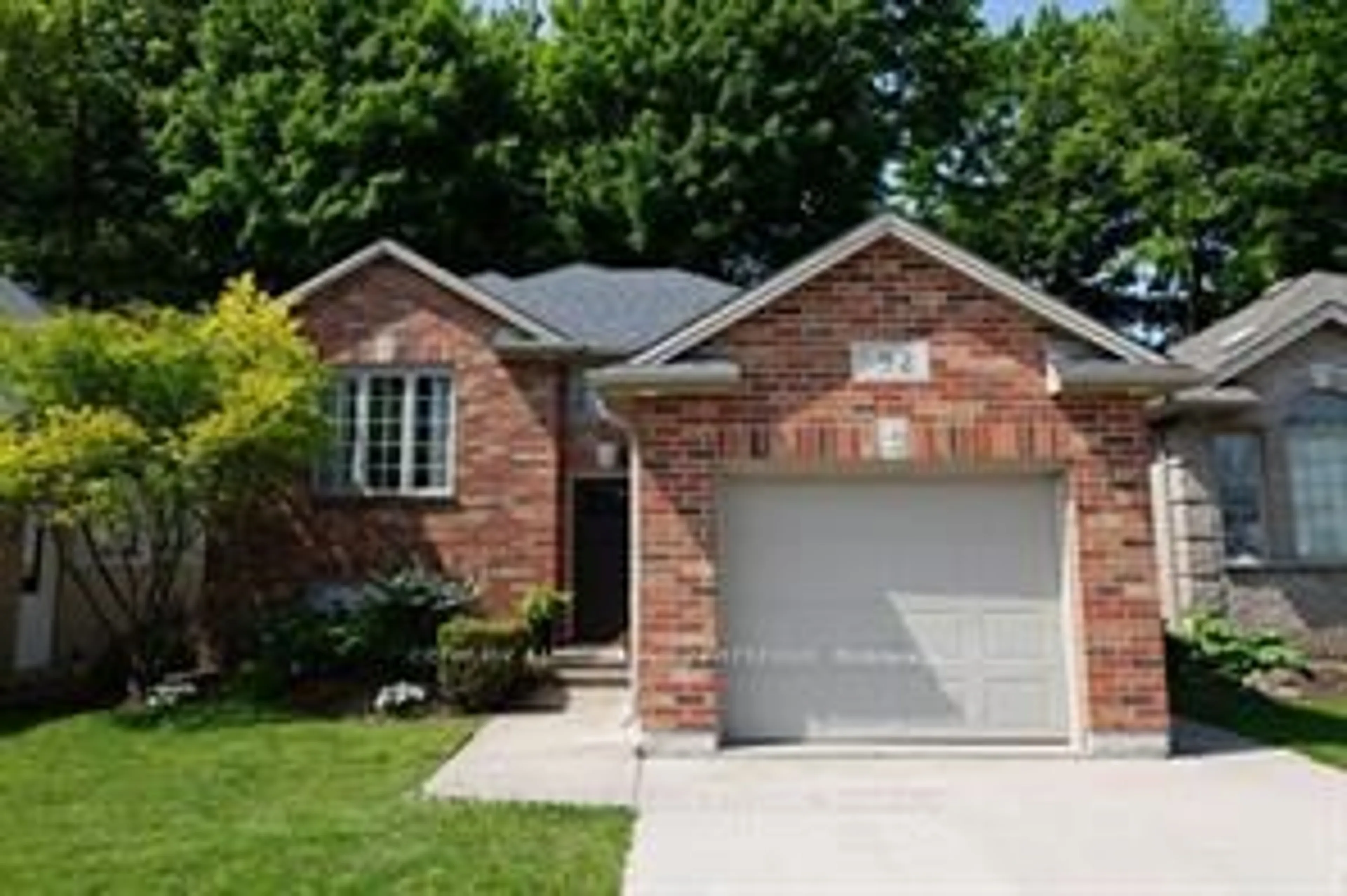 Home with brick exterior material, street for 92 Ridge St, Strathroy-Caradoc Ontario N7G 4K1
