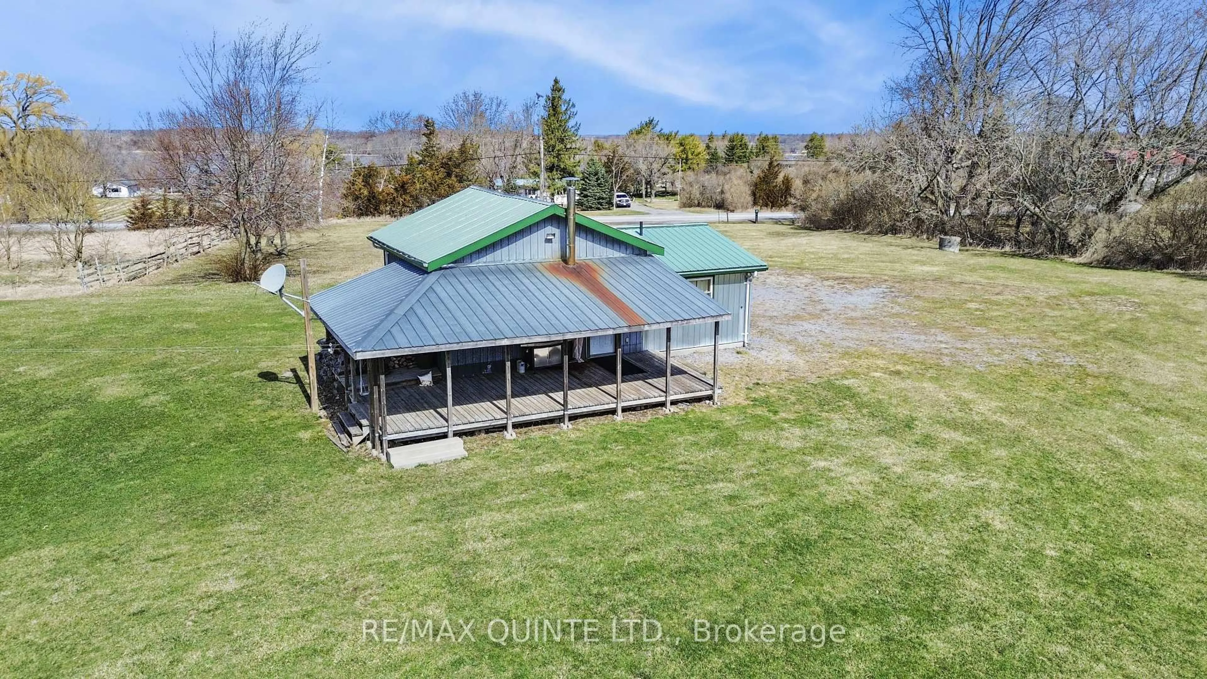A pic from outside/outdoor area/front of a property/back of a property/a pic from drone, water/lake/river/ocean view for 2878 County Road 15, Prince Edward County Ontario K0K 2T0
