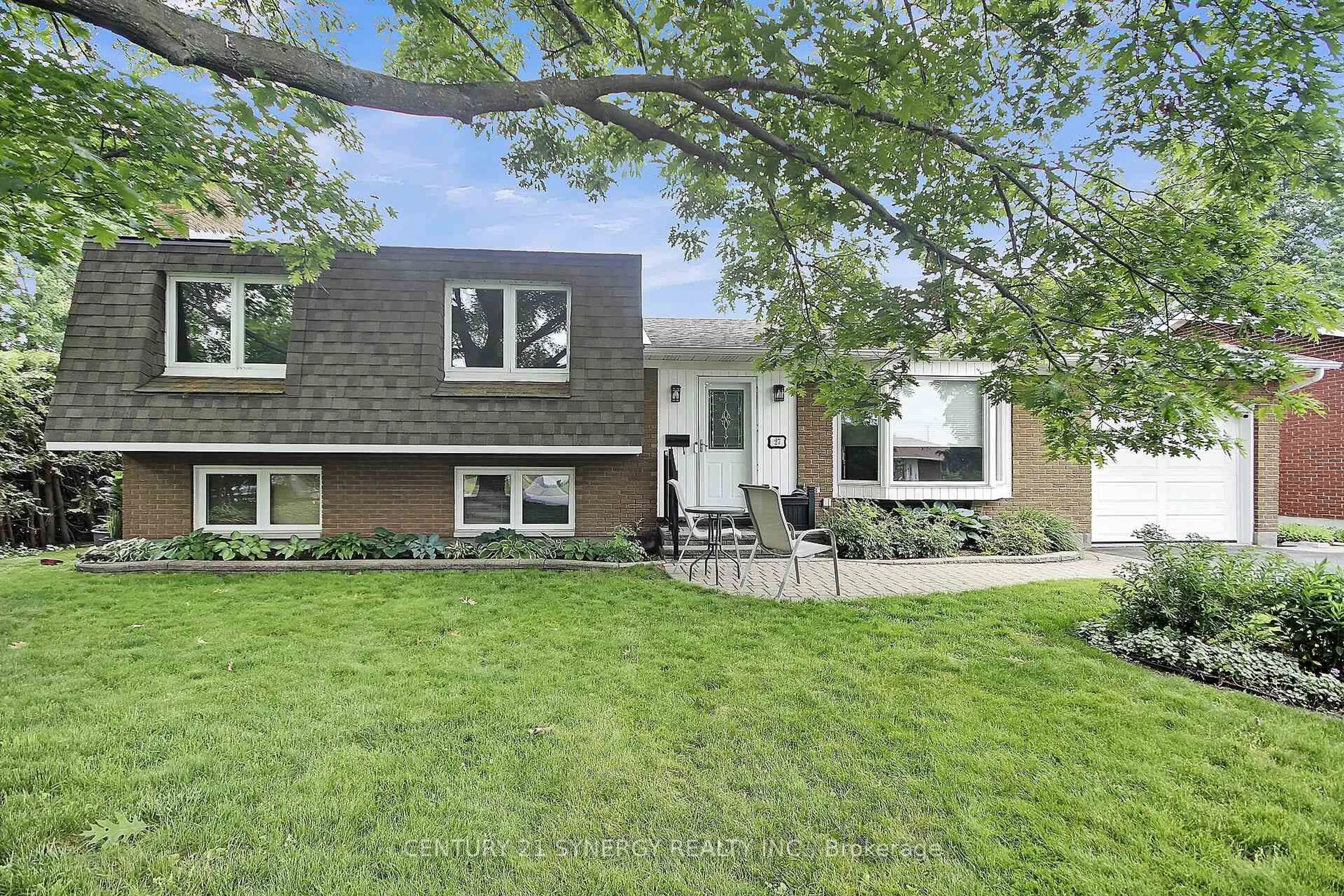 Home with brick exterior material, street for 27 Tripp Cres, Barrhaven Ontario K2J 1C5